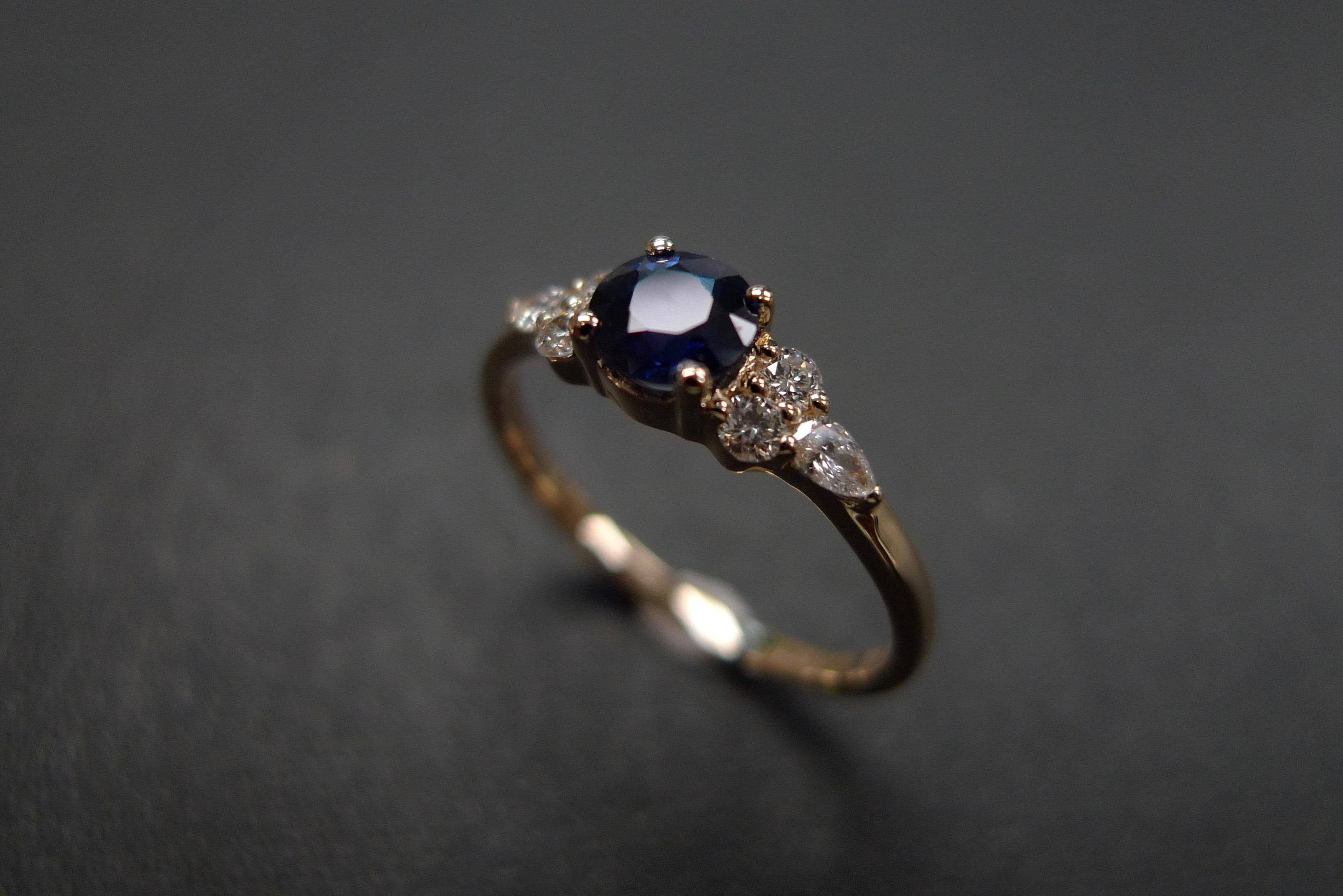 For Sale:  Pear Shape Diamond and Round Brilliant Cut Blue Sapphire Engagement Ring 10