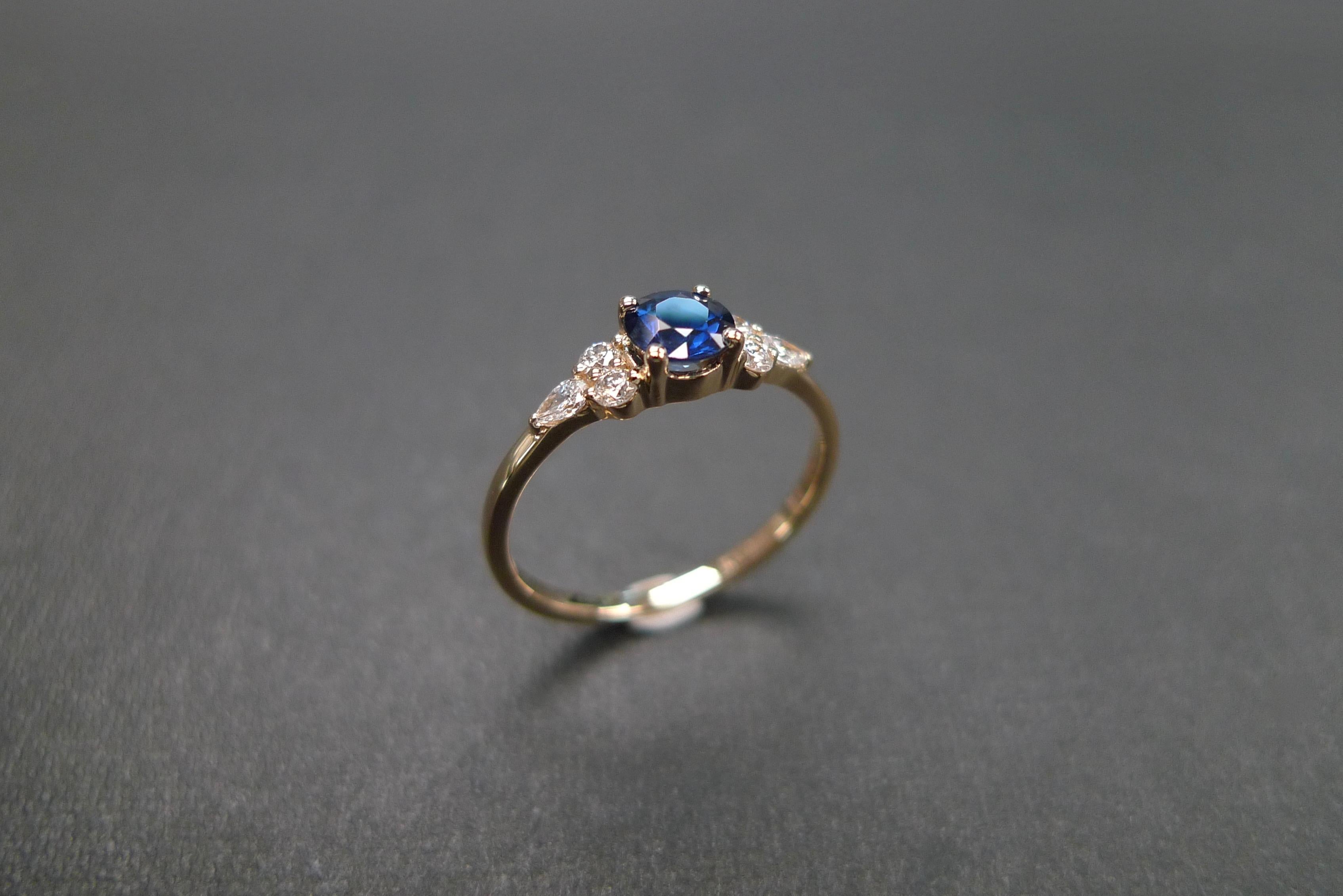 For Sale:  Pear Shape Diamond and Round Brilliant Cut Blue Sapphire Engagement Ring 7