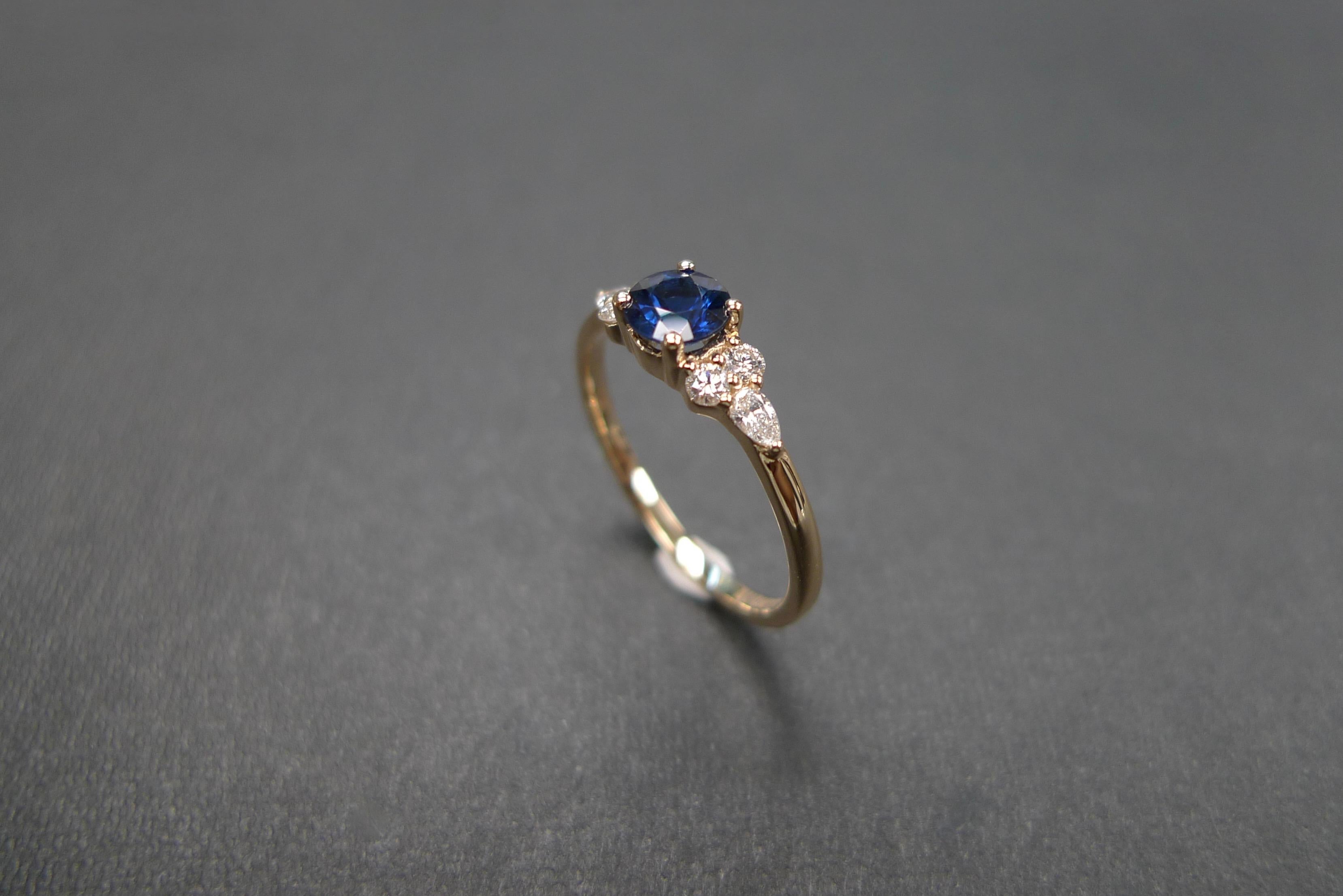 For Sale:  Pear Shape Diamond and Round Brilliant Cut Blue Sapphire Engagement Ring 8