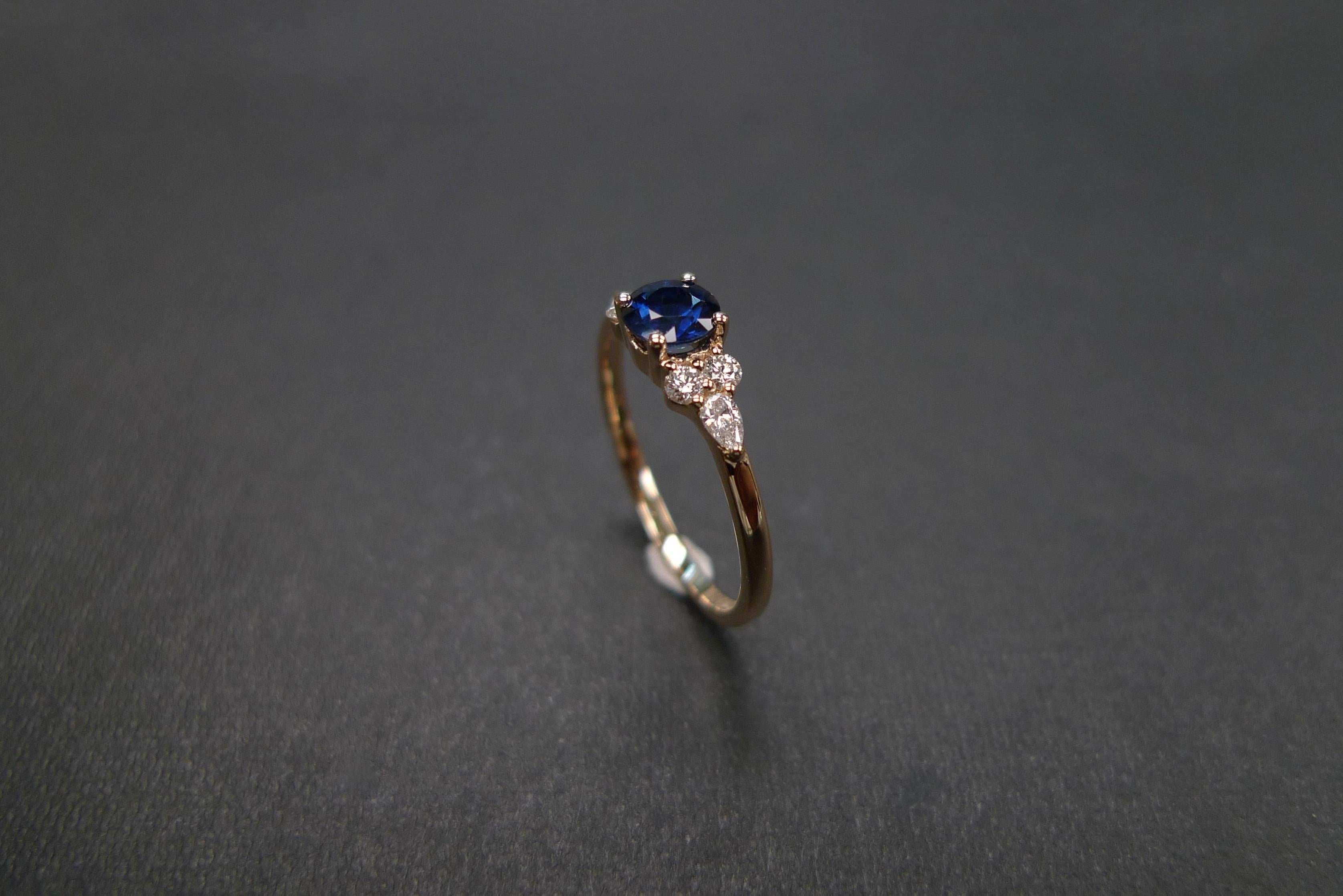 For Sale:  Pear Shape Diamond and Round Brilliant Cut Blue Sapphire Engagement Ring 9