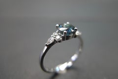 Pear Shape Diamond and Teal Blue Sapphire Engagement Ring in 18K White Gold