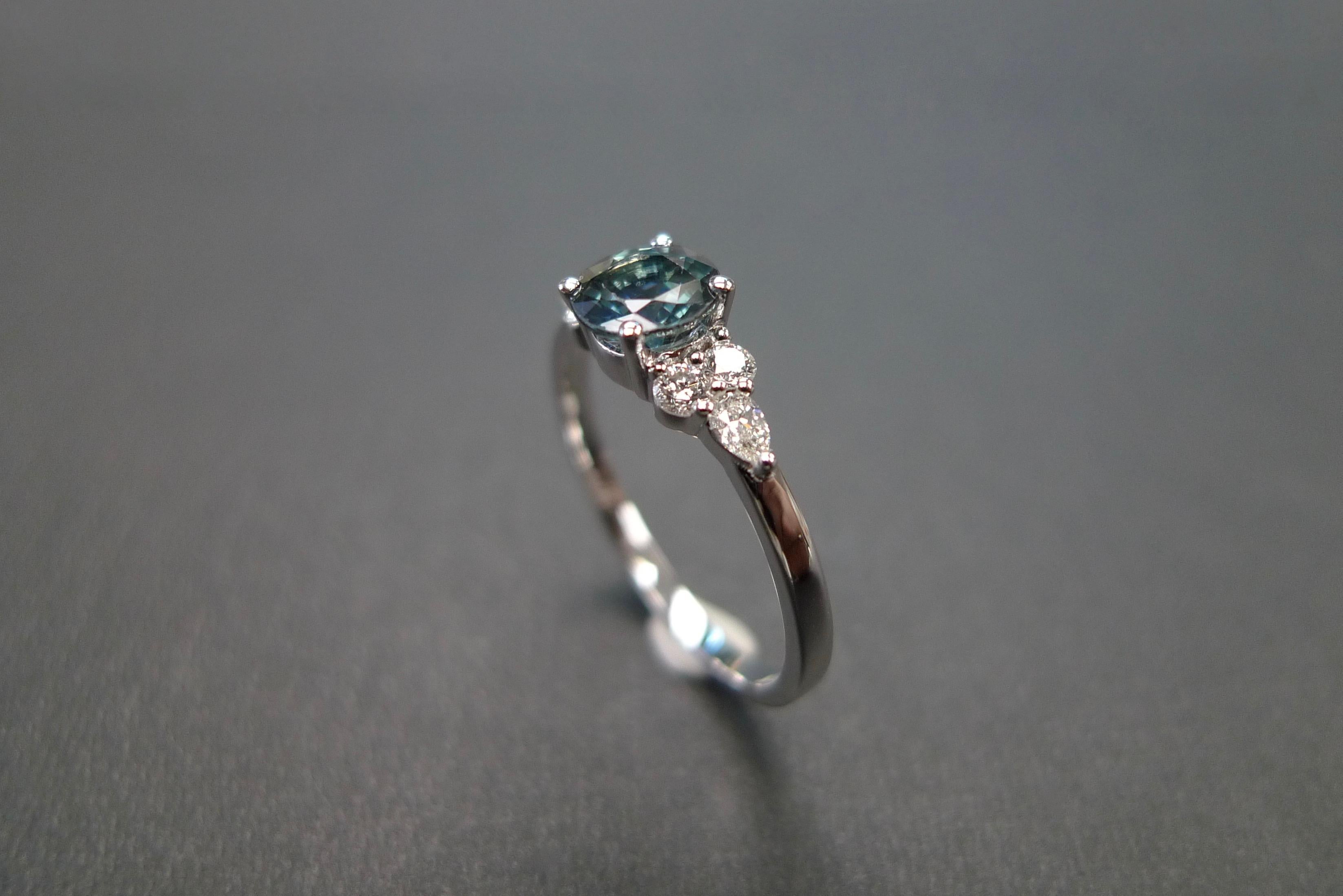 For Sale:  Pear Shape Diamond and Teal Blue Sapphire Engagement Ring in 18K White Gold 7