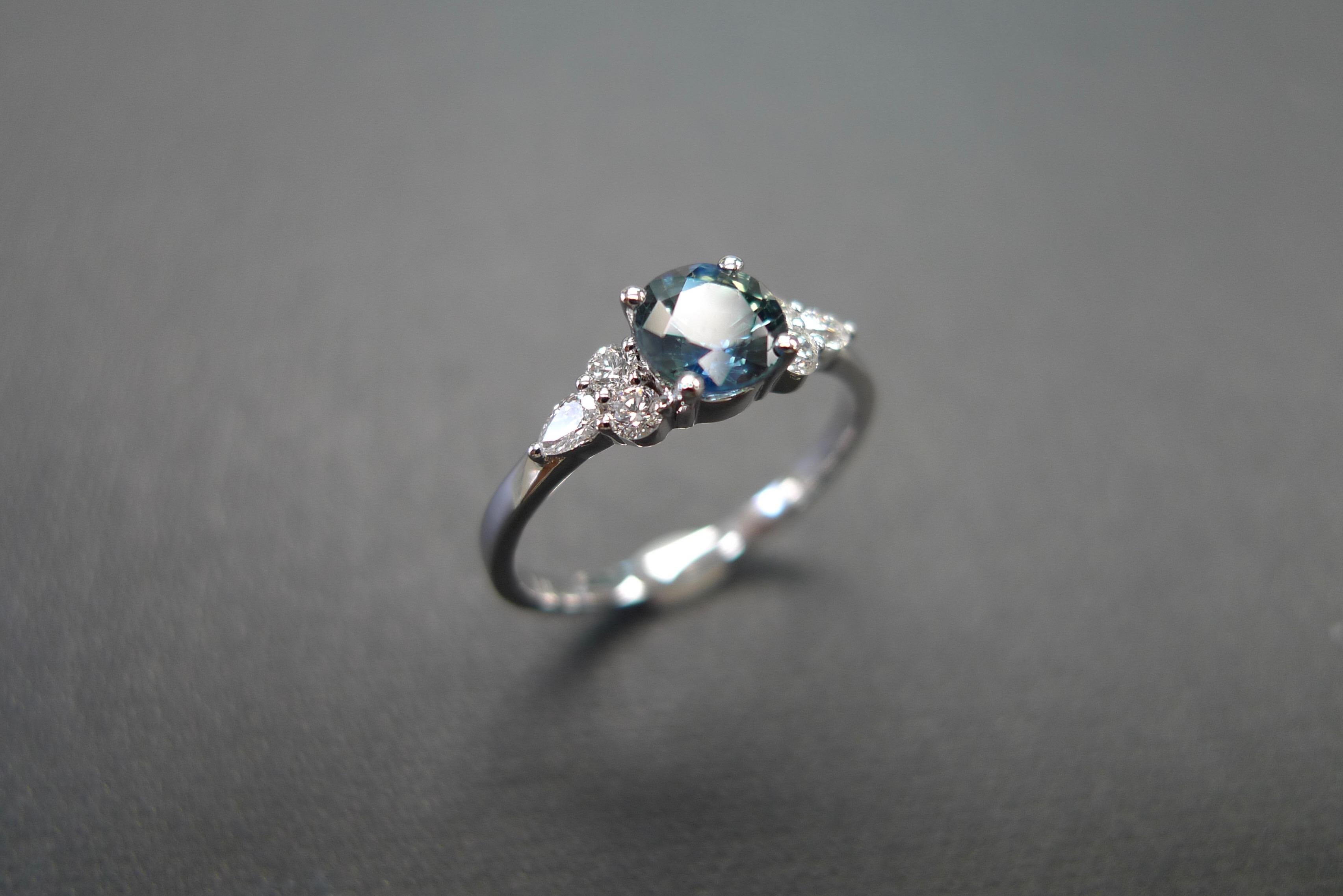 For Sale:  Pear Shape Diamond and Teal Blue Sapphire Engagement Ring in 18K White Gold 9