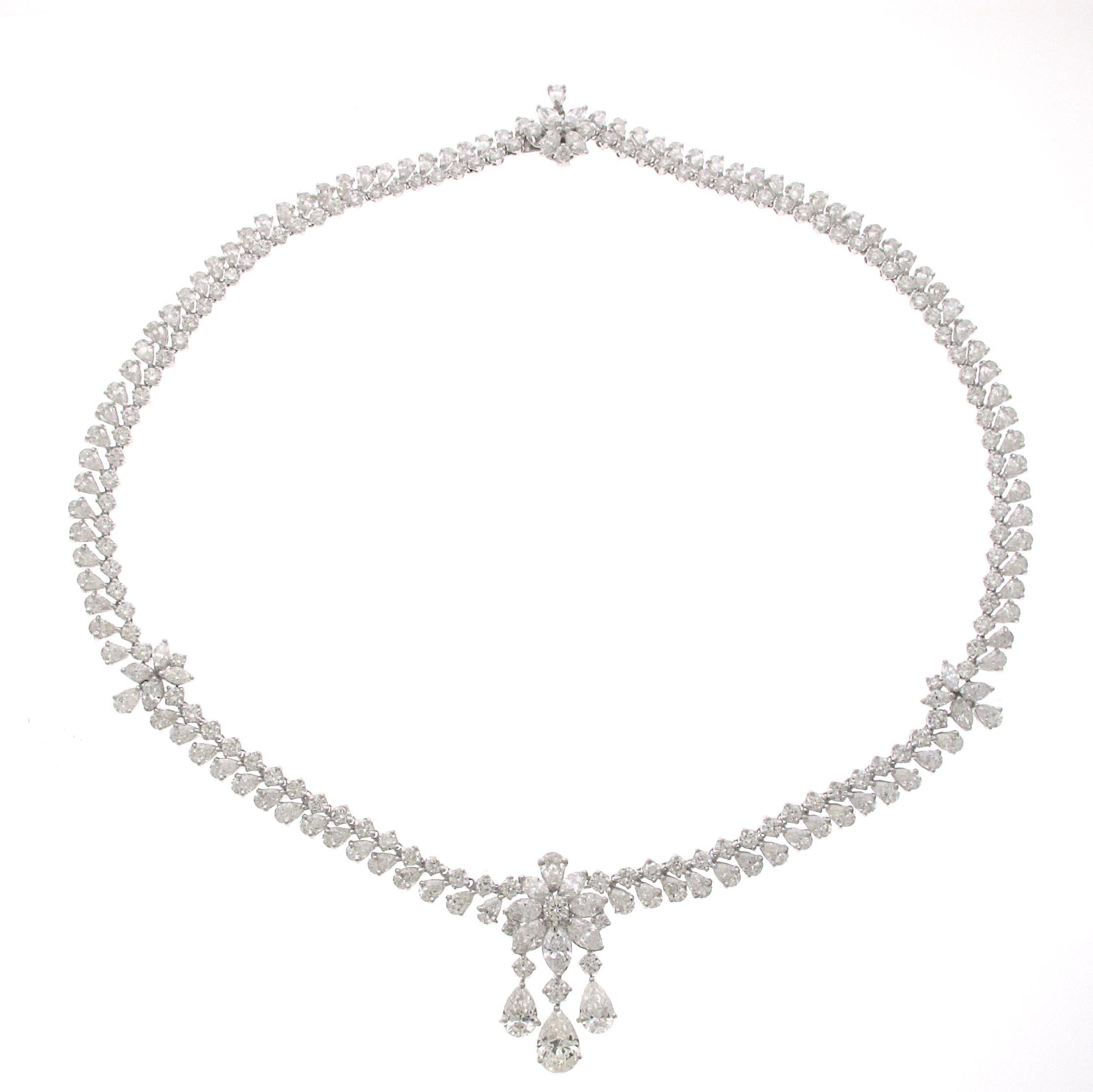Fantastic piece to wear to that big event you have. This platinum and diamond necklace has 238 diamonds throughout weighing a total of 36.78 carats. These are all bright white and clean diamonds. The piece de resistance are the pear shapes hanging