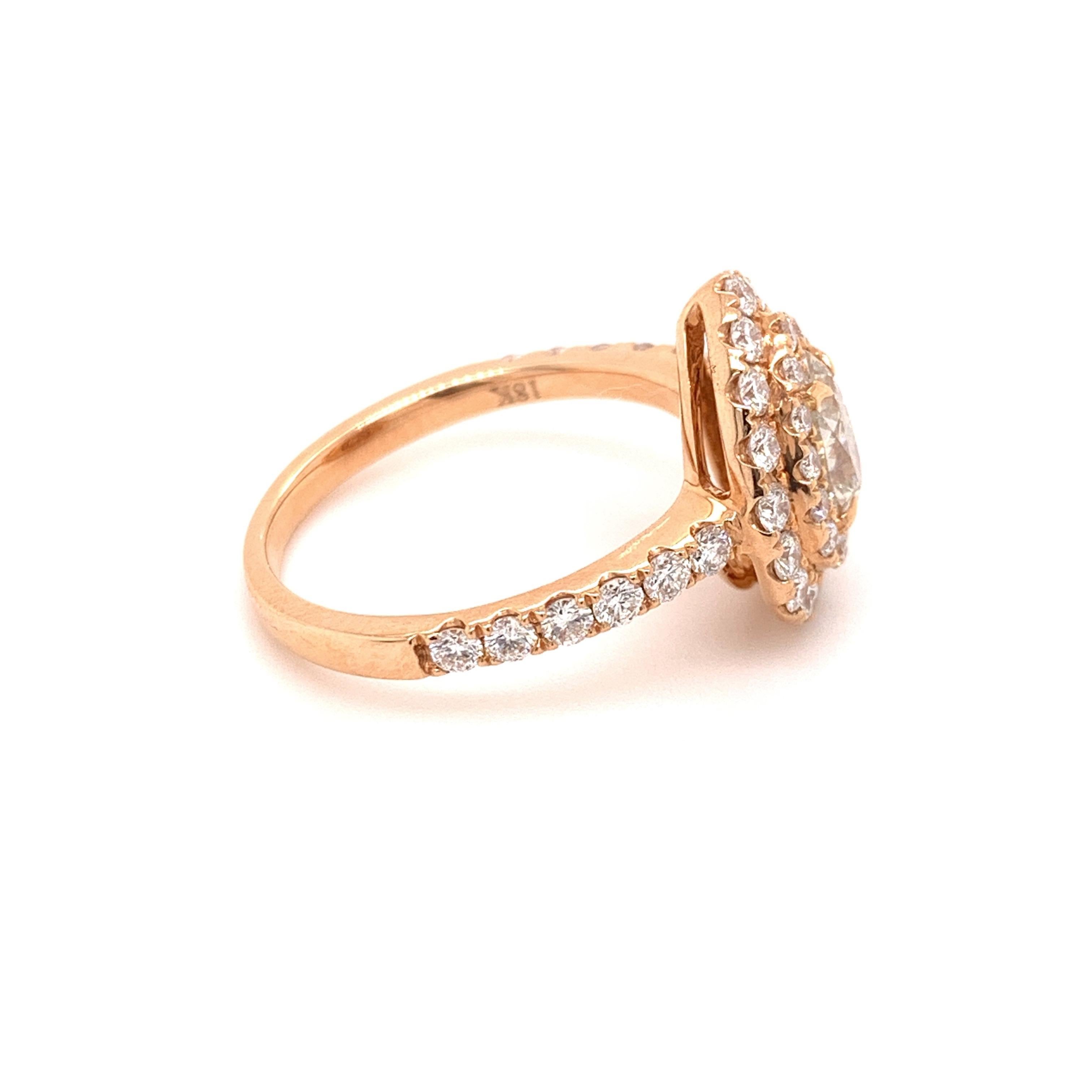Classic diamond ring. Sparkling, pear brilliant cut, natural 0.51 carat center diamond encased with four knife prongs, accented with round brilliant cut diamonds on the shoulder and two rows framing the center diamond. Beautiful handcrafted design