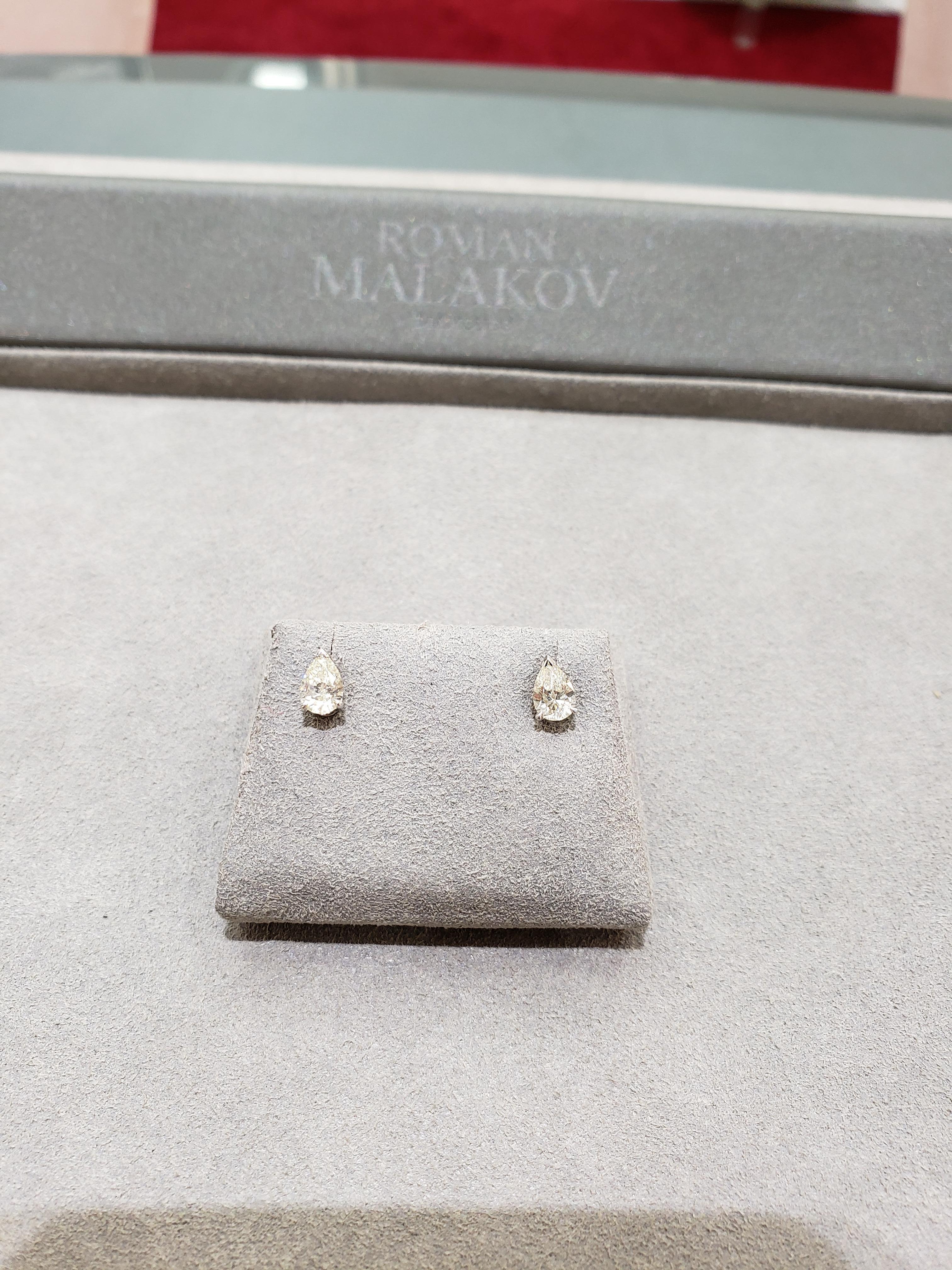 Simple but elegant stud earrings set with two pear shape diamonds weighing 1.03 carats total. Made in 14K white gold. Perfect for your everyday use. 

Roman Malakov is a custom house, specializing in creating anything you can imagine. If you would