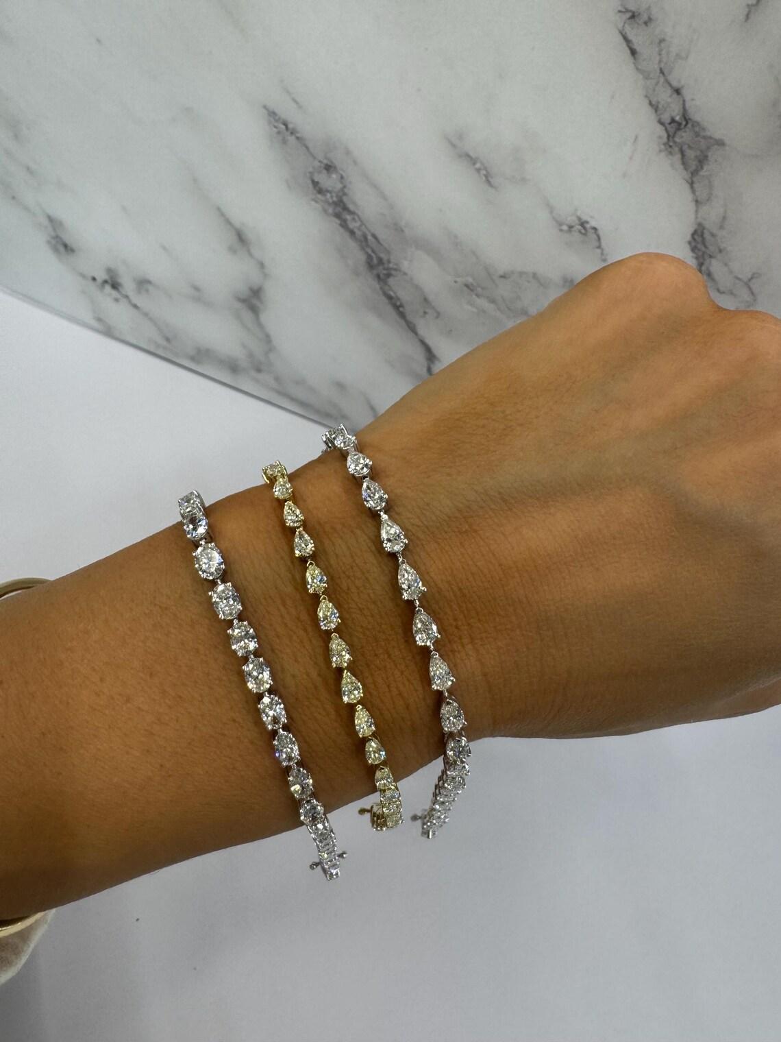 Contemporary Pear Shape Diamond Tennis Bracelet 6.38 Carats 14 Karat White Gold H VS2-SI1