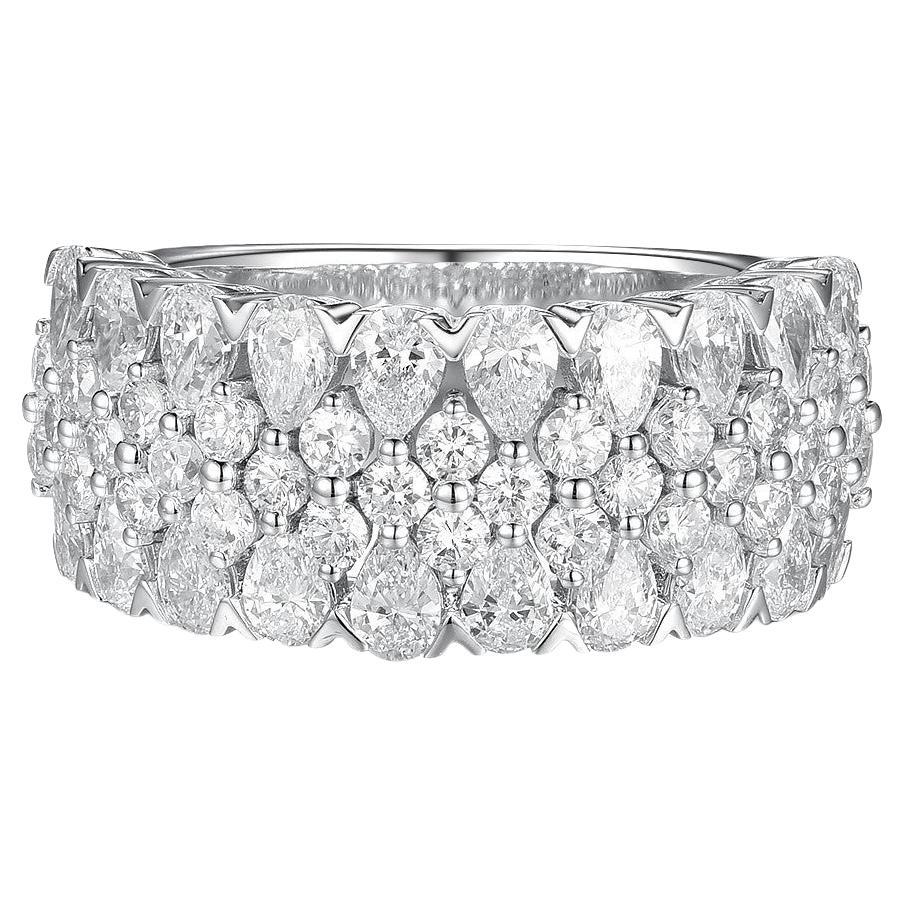 This diamond band ring features 2.02 carat of pear shape diamonds, each weight approximately 0.10 carat. Round diamonds weight 0.84 carat each weight around 0.03 carat. Band is set in 18 karat white gold, it is stack-able with other thinner band