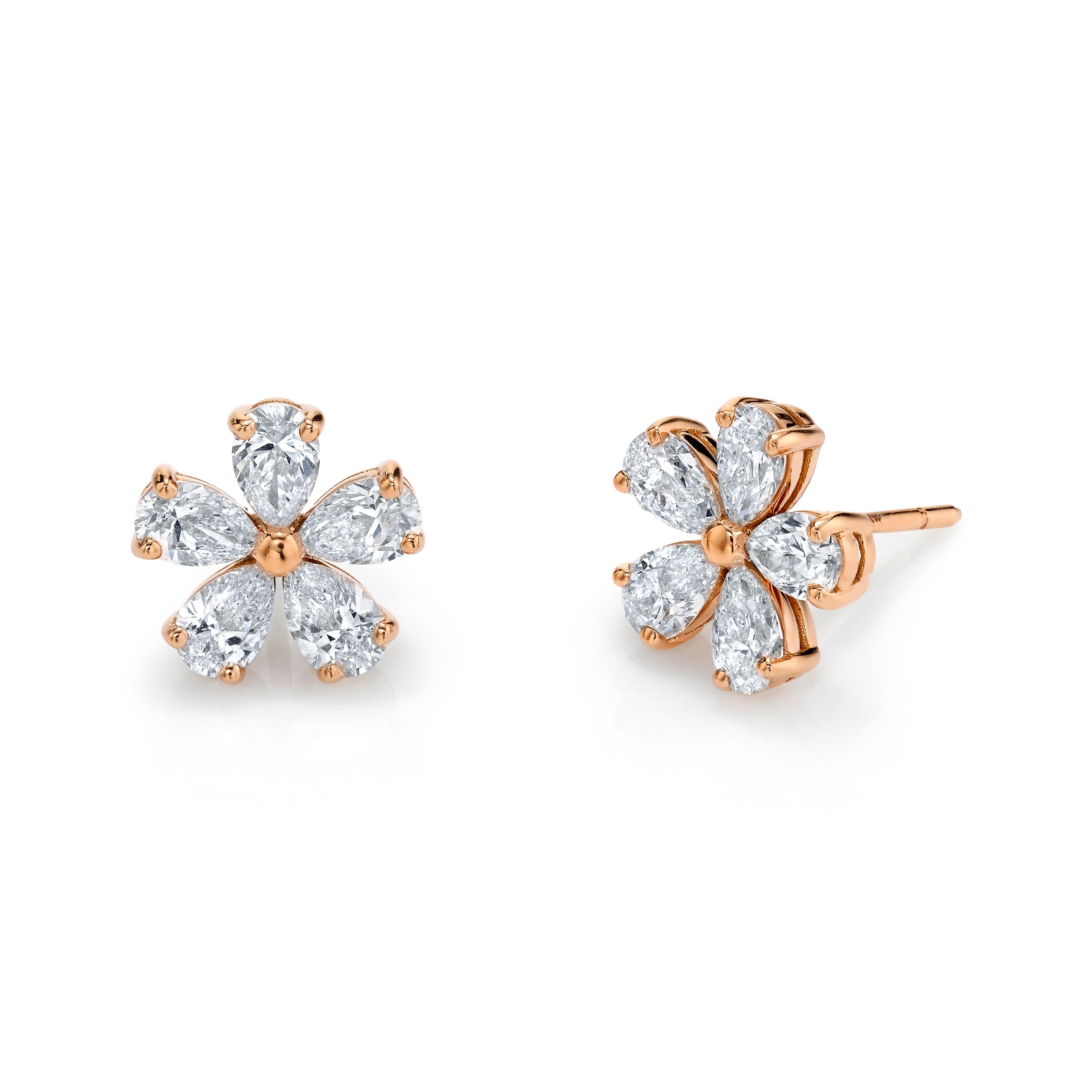 Pear Shape Diamonds set in 18k yellow gold to create a stunning pair of flower earrings.
1.88 carats total weight  
Color G-H  Clarity VS-SI

Also available in 18k rose gold and white gold.