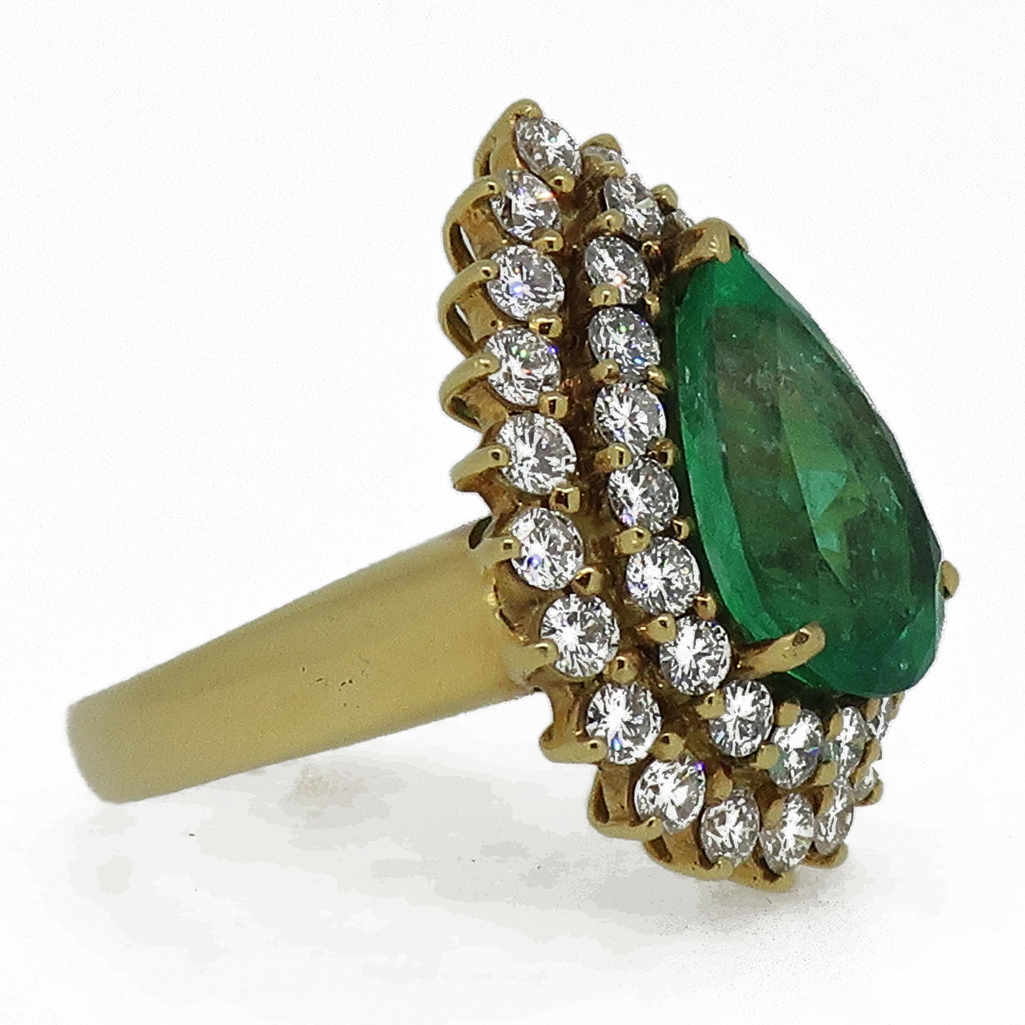 Contemporary Pear Shape Emerald and Diamond Cluster Ring Yellow Gold For Sale