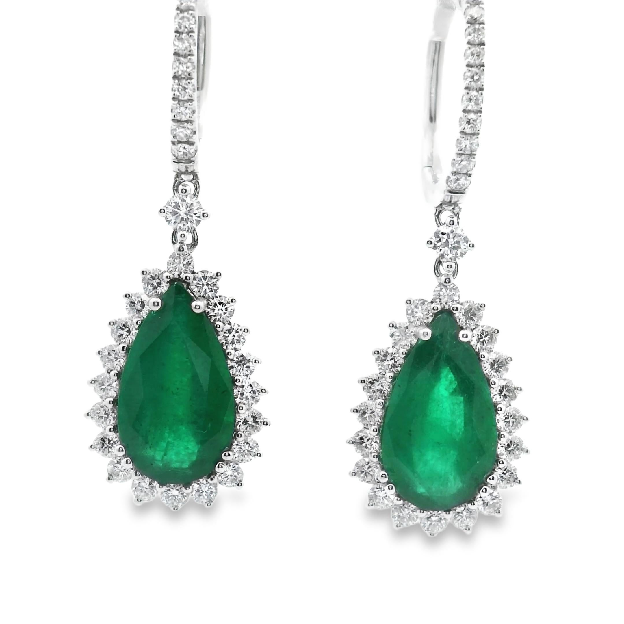 Contemporary Pear Shape Emerald and Diamond Halo Dangle Drop Earrings 18k White Gold For Sale