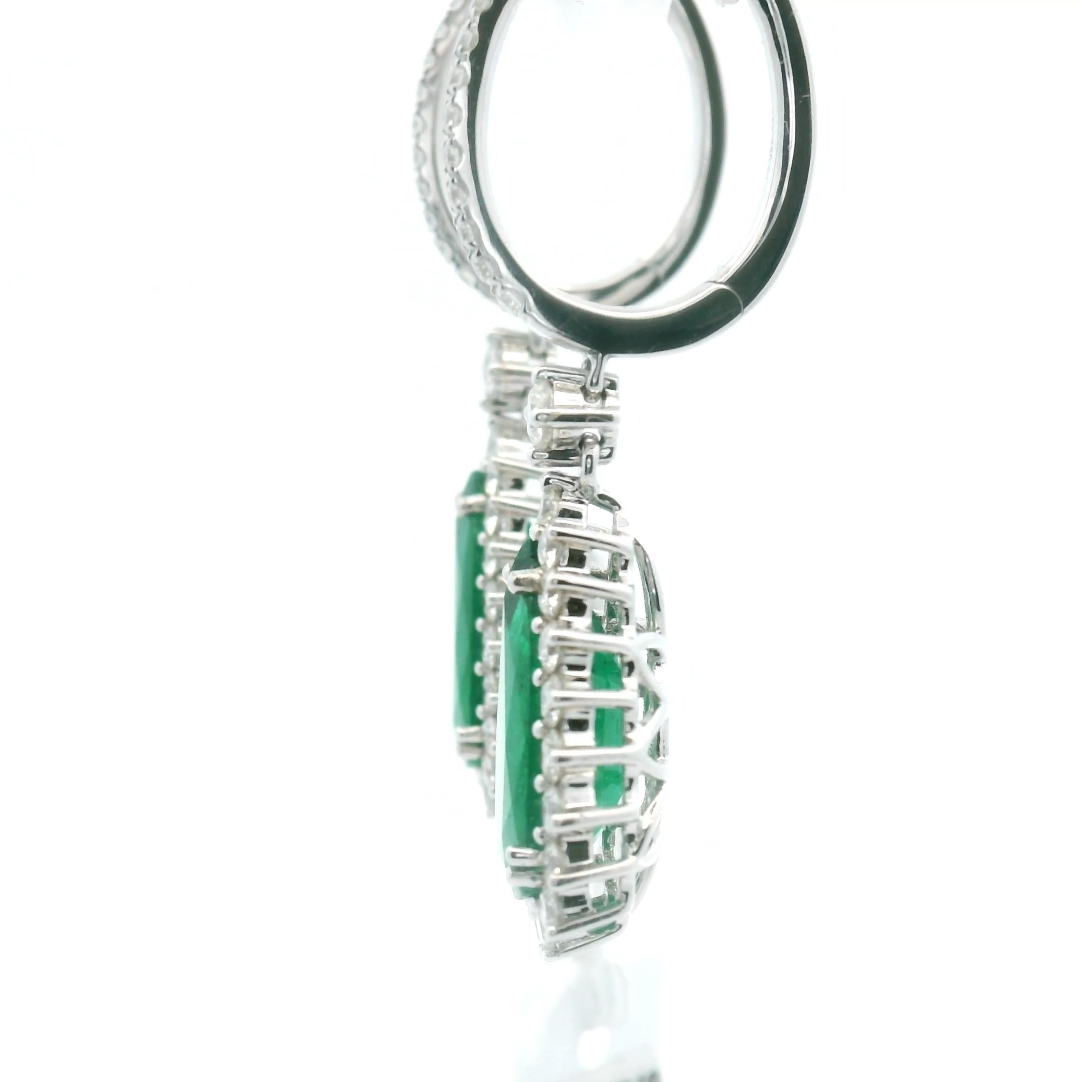 Women's Pear Shape Emerald and Diamond Halo Dangle Drop Earrings 18k White Gold For Sale
