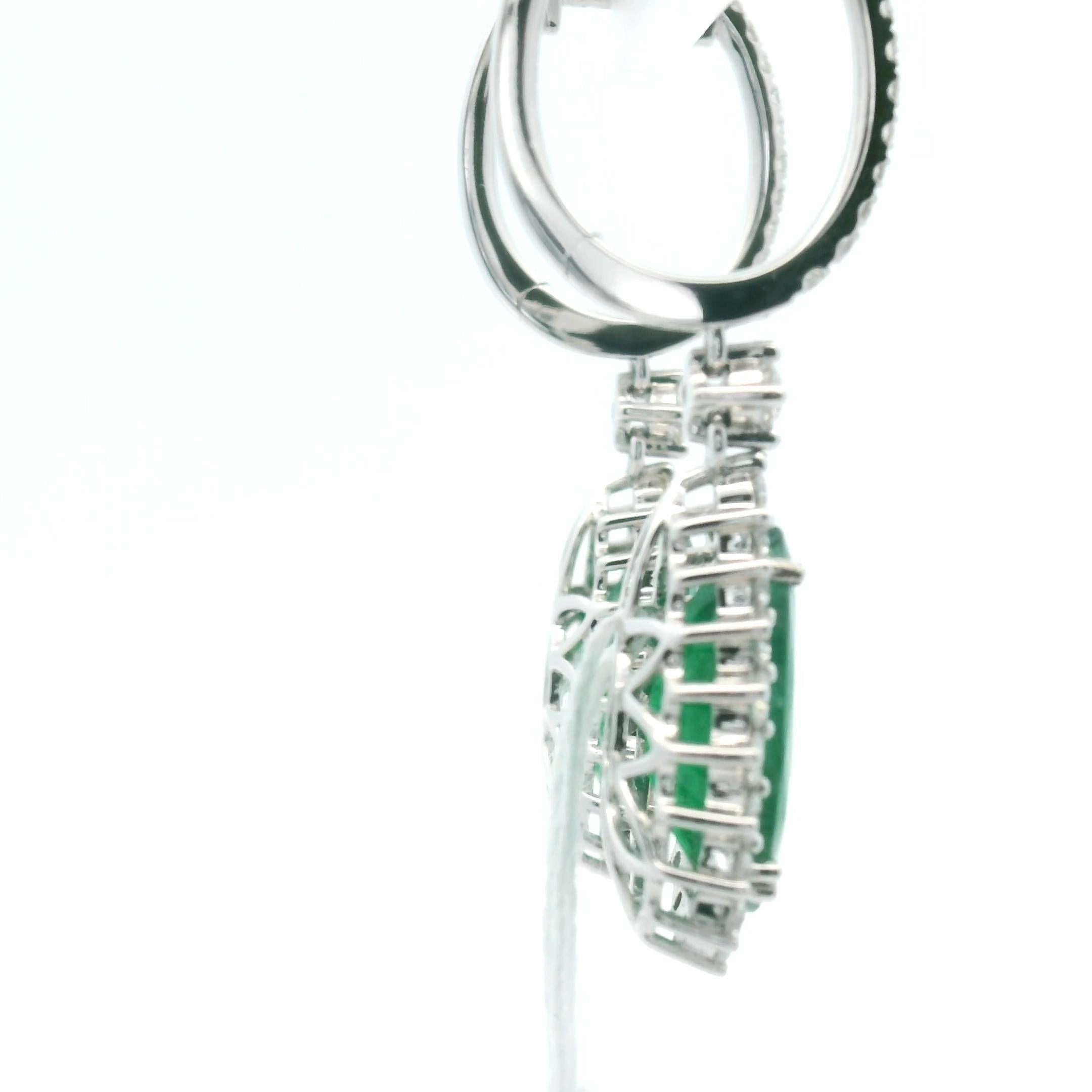 Pear Shape Emerald and Diamond Halo Dangle Drop Earrings 18k White Gold For Sale 1