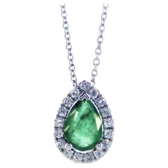 Pear Shape Emerald and diamonds Halo Necklace