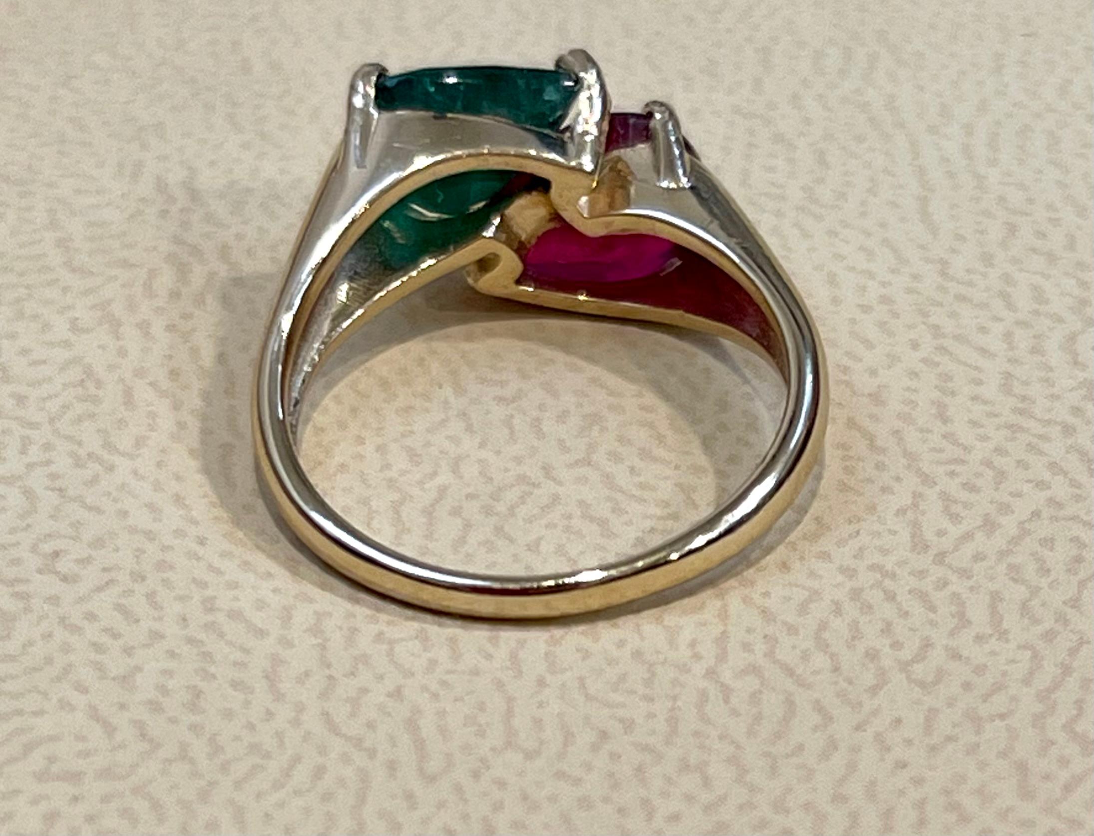 Emerald Cut Pear Shape Emerald and Ruby Engagement Ring in 14 Karat Gold