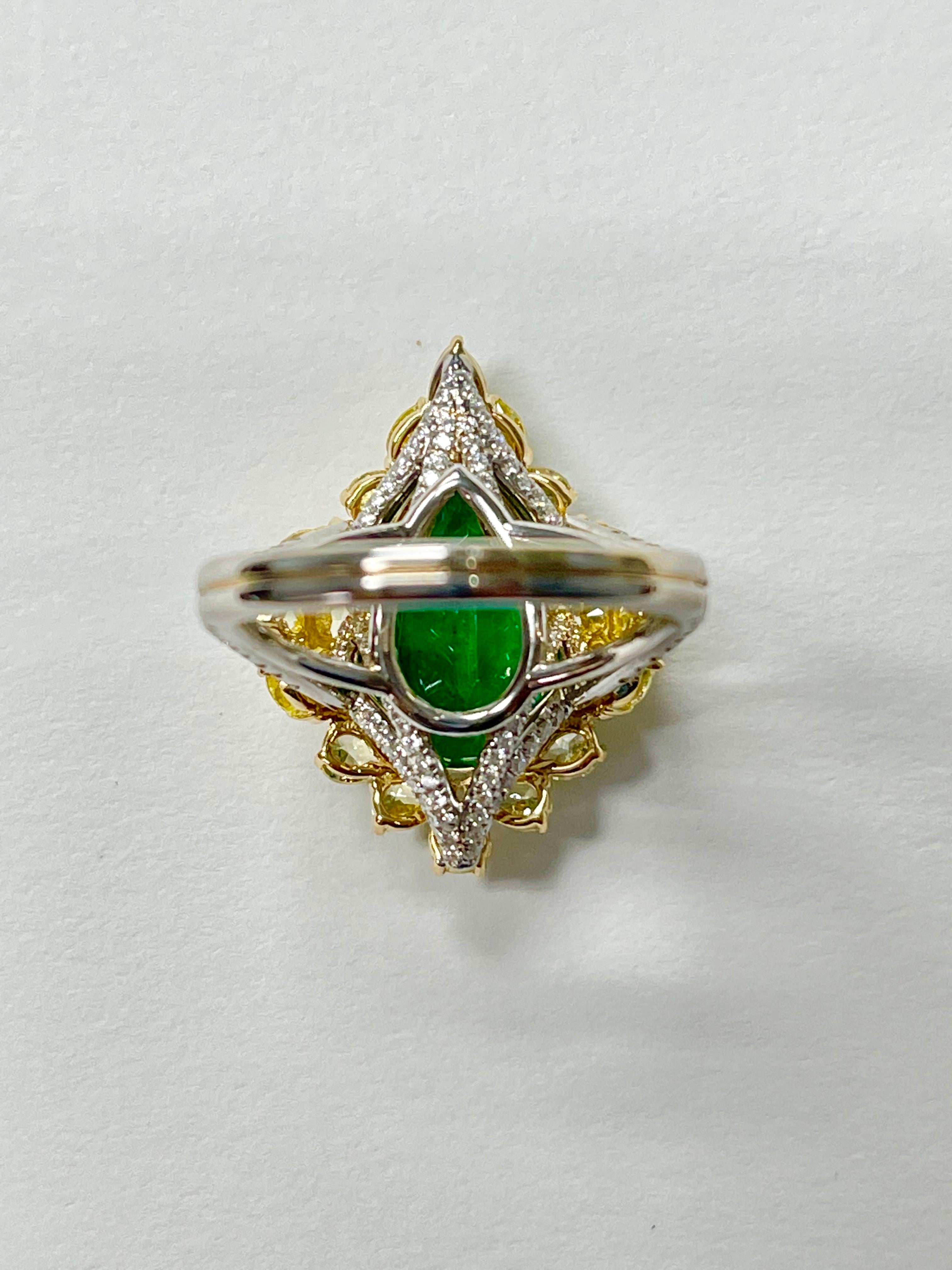 Women's or Men's Pear Shape Emerald and Yellow Diamond Engagement Ring in Yellow and White Gold For Sale