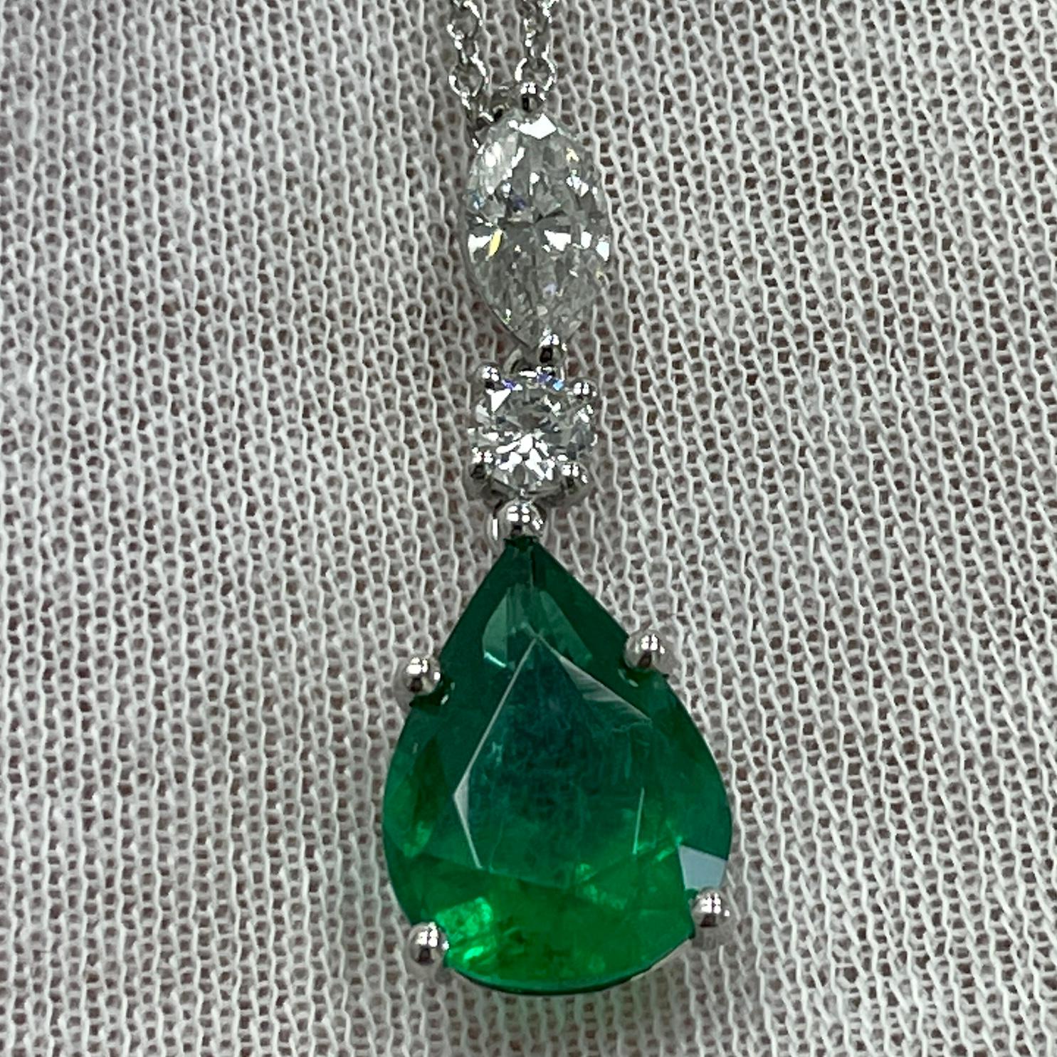 A simple yet elegant pear shape emerald pendant in platinum, on a 14k white diamond by the yard chain with a total diamond weight of .86 carats