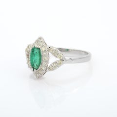 Natural Emerald Gemstone Wedding Ring with Diamonds in 18 Karat Solid White Gold