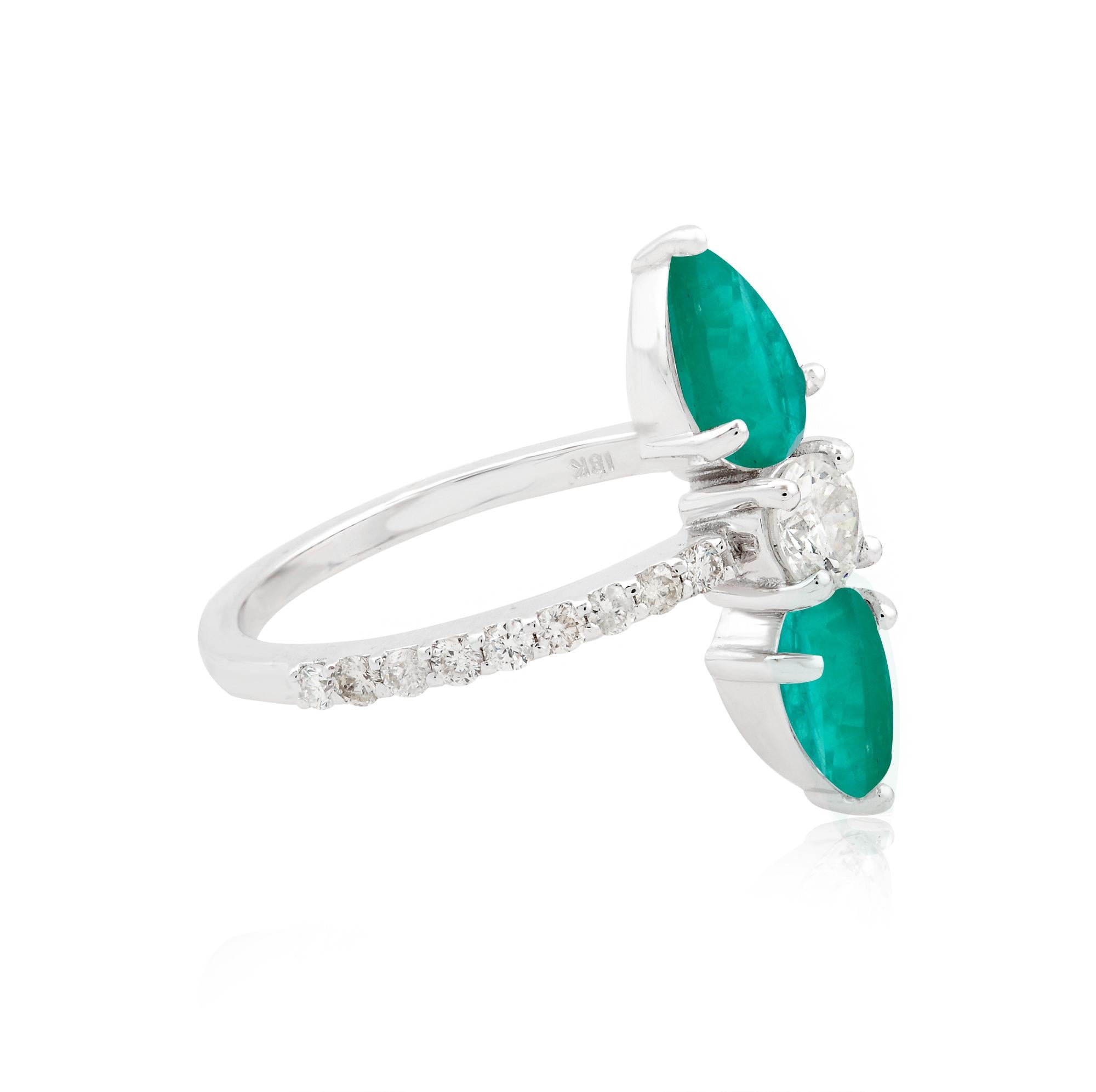 Indulge in the captivating beauty of this handmade ring, featuring a pear-shaped emerald gemstone nestled in a setting of 18-karat white gold. The vibrant green hue of the emerald exudes elegance and allure, making it a true standout in any jewelry