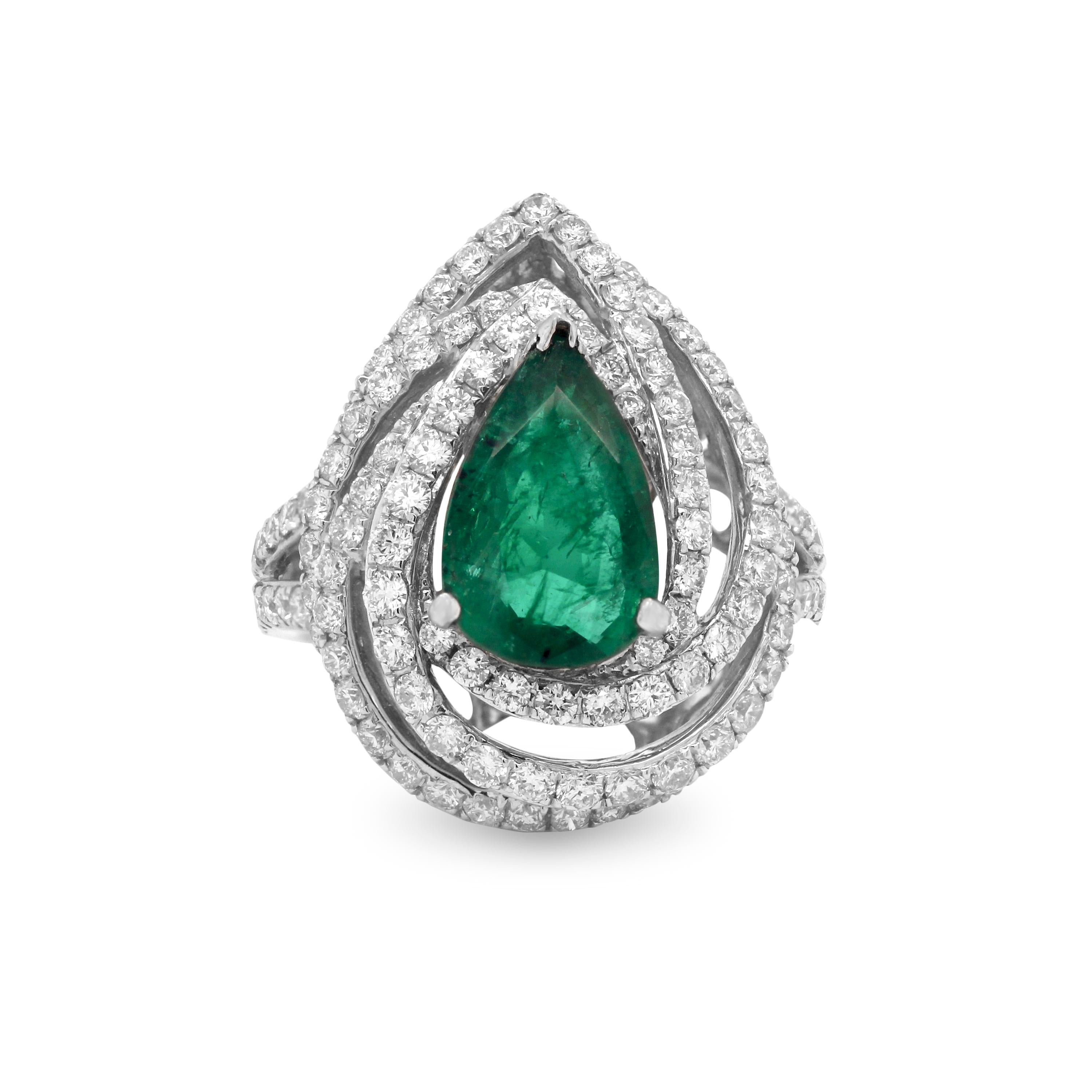 18k White Gold and Diamond Cocktail Ring with Pear Shape Emerald Center

2.27 carat Pear Shape Emerald center. Emerald is Zambian origin. 

2.00 carat G color, VS clarity diamonds

23mm face width. 3mm band width.  

Size 7. Sizable by request.