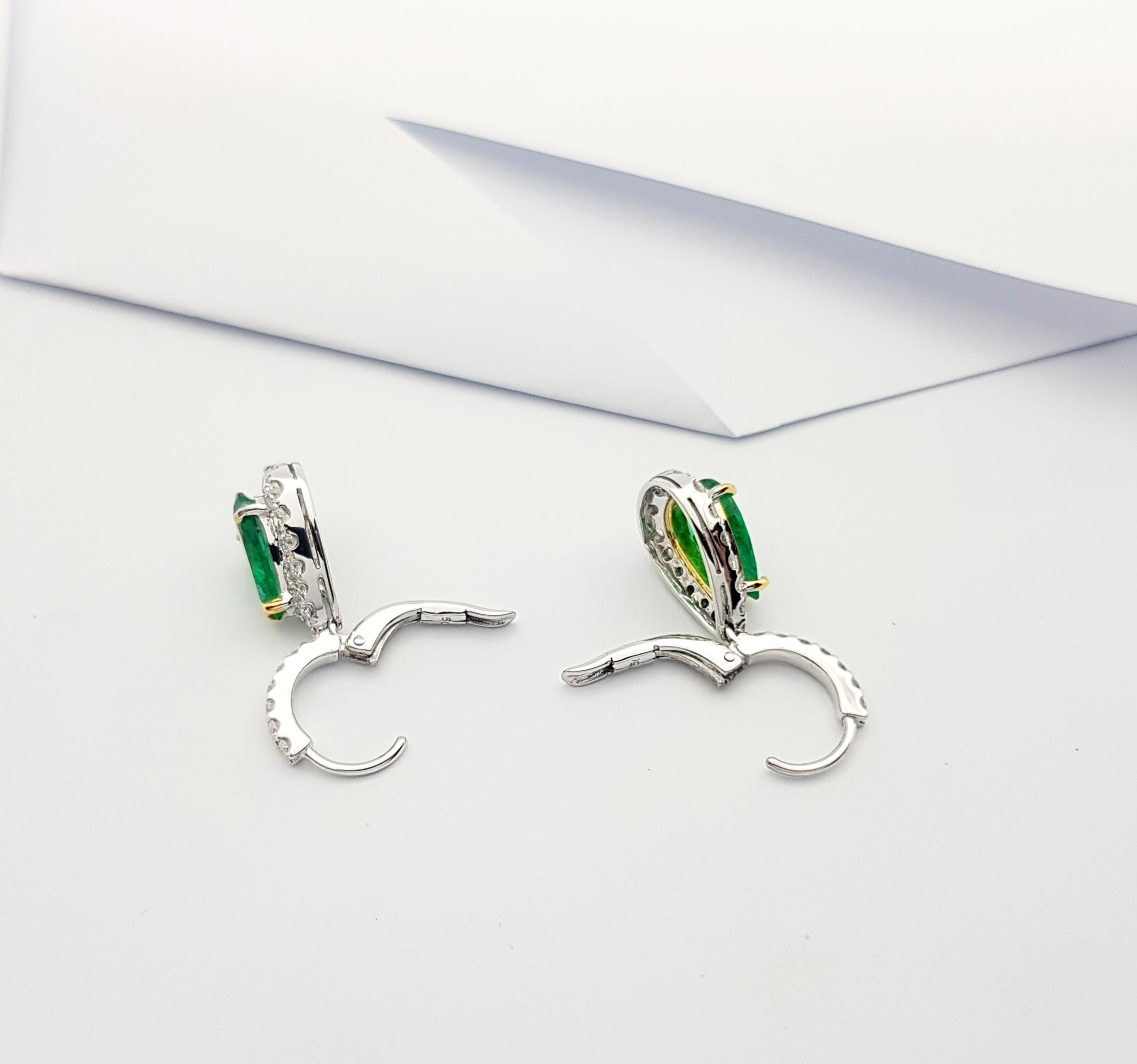 Pear Cut Pear Shape Emerald with Diamond Earrings Set in 18k White Gold Settings For Sale