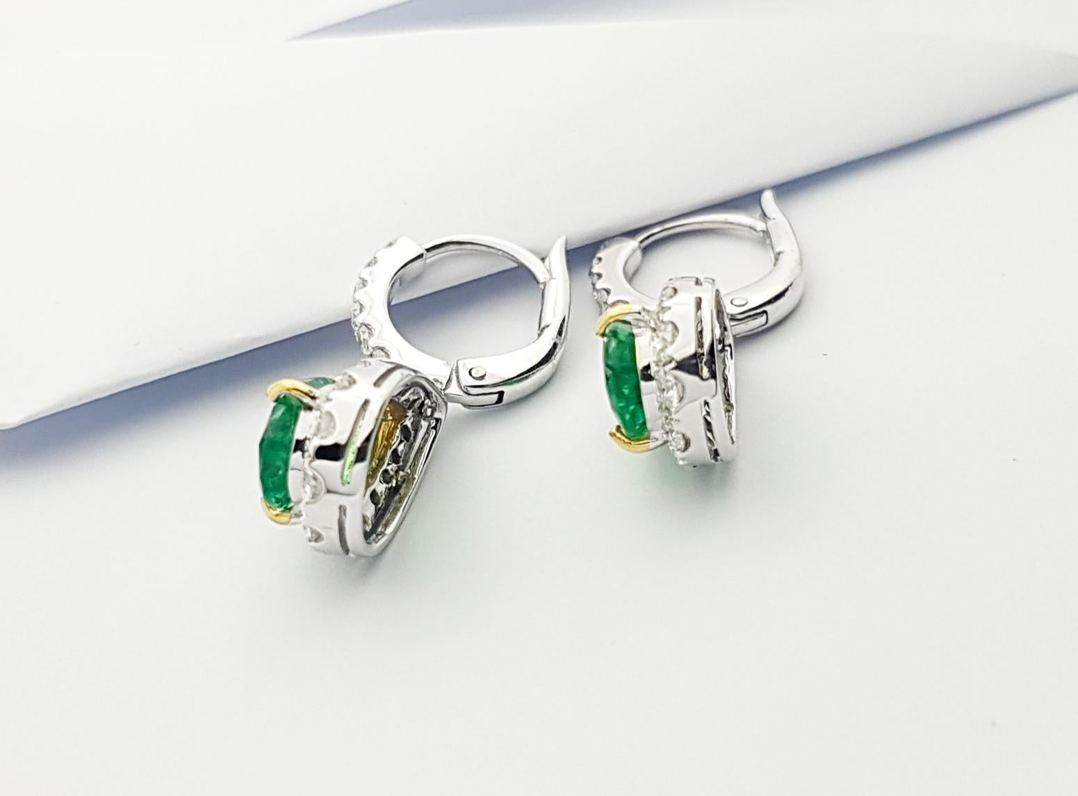 Women's Pear Shape Emerald with Diamond Earrings Set in 18k White Gold Settings For Sale