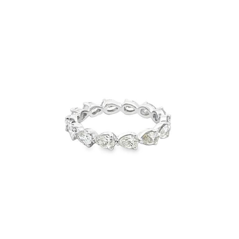 We are thrilled to introduce to you our latest diamond pear-shaped eternity band. This band is unique because of the perfect balance between the diamonds itself. It has twelve stones in F-J grade color and a clarity grade of SI-VS with a 2.00 total