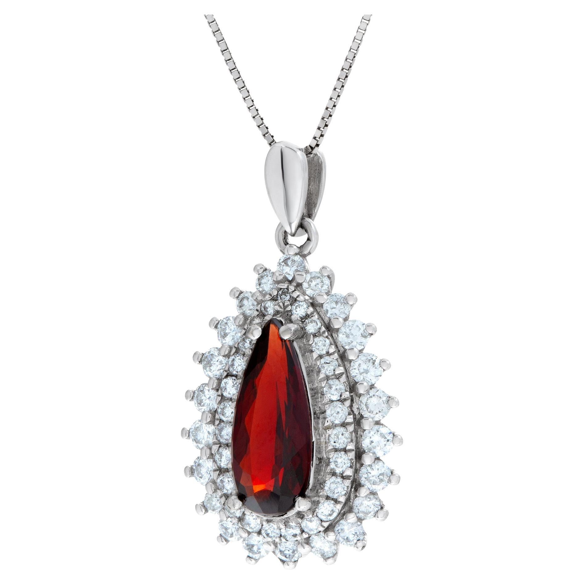 Pear shape Garnet pendant surrounded by diamonds set in 18K white gold, w/ 16"  For Sale