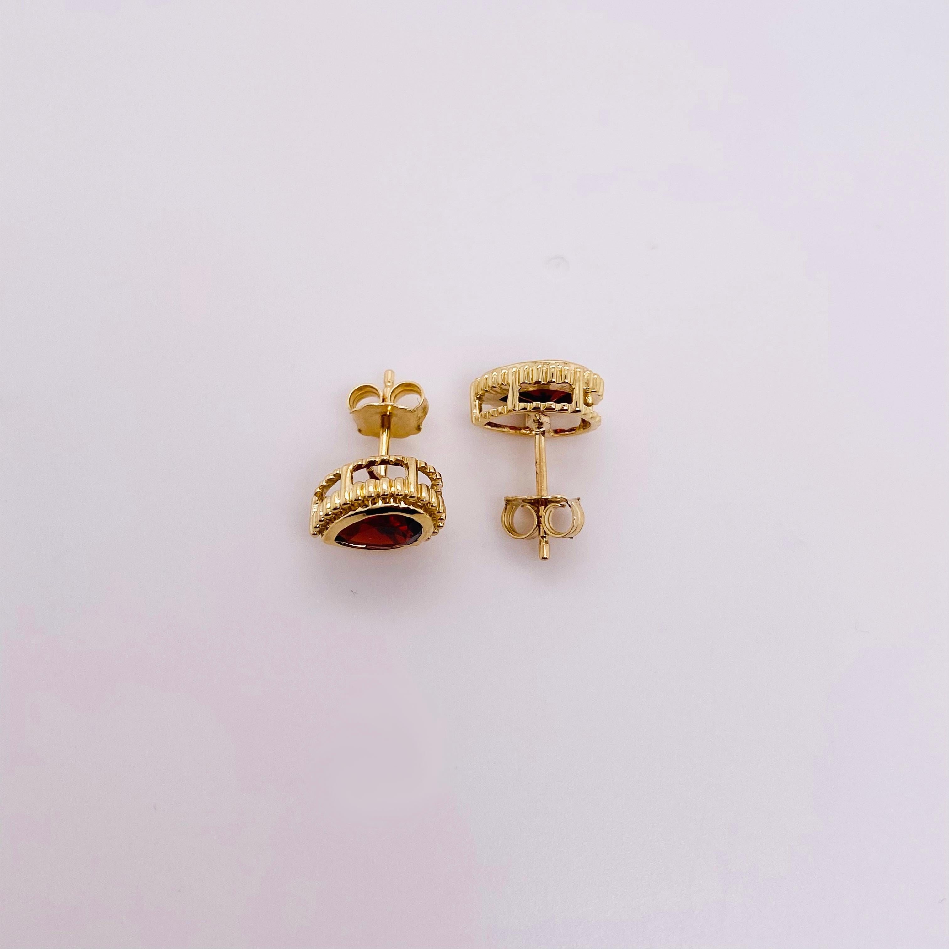The details for these gorgeous earrings are listed below:
Metal Quality: 14 K Yellow Gold 
Earring Type: Stud 
Gemstone: Garent 
Gemstone Weight: 2.84 st
Gemstone Color: Red 
Measurements: 10.6mm  X 8.6 mm
Post Type: Stud 
Total Carat Weight: 3.1 g 