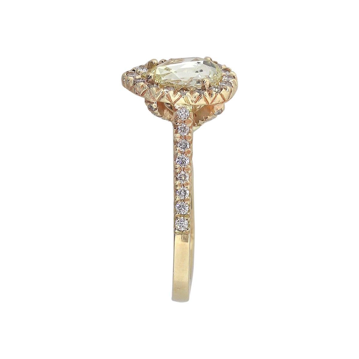 Material: 14k Yellow Gold
Center Diamond Details: Approx. 0.89ct Pear shape diamond. Diamond is Fancy Light Yellow in color and VS in clarity. GIA 5192190513
Adjacent Diamond Details: Approx. 0.50 of round cut diamonds. Diamonds are G/H in color and