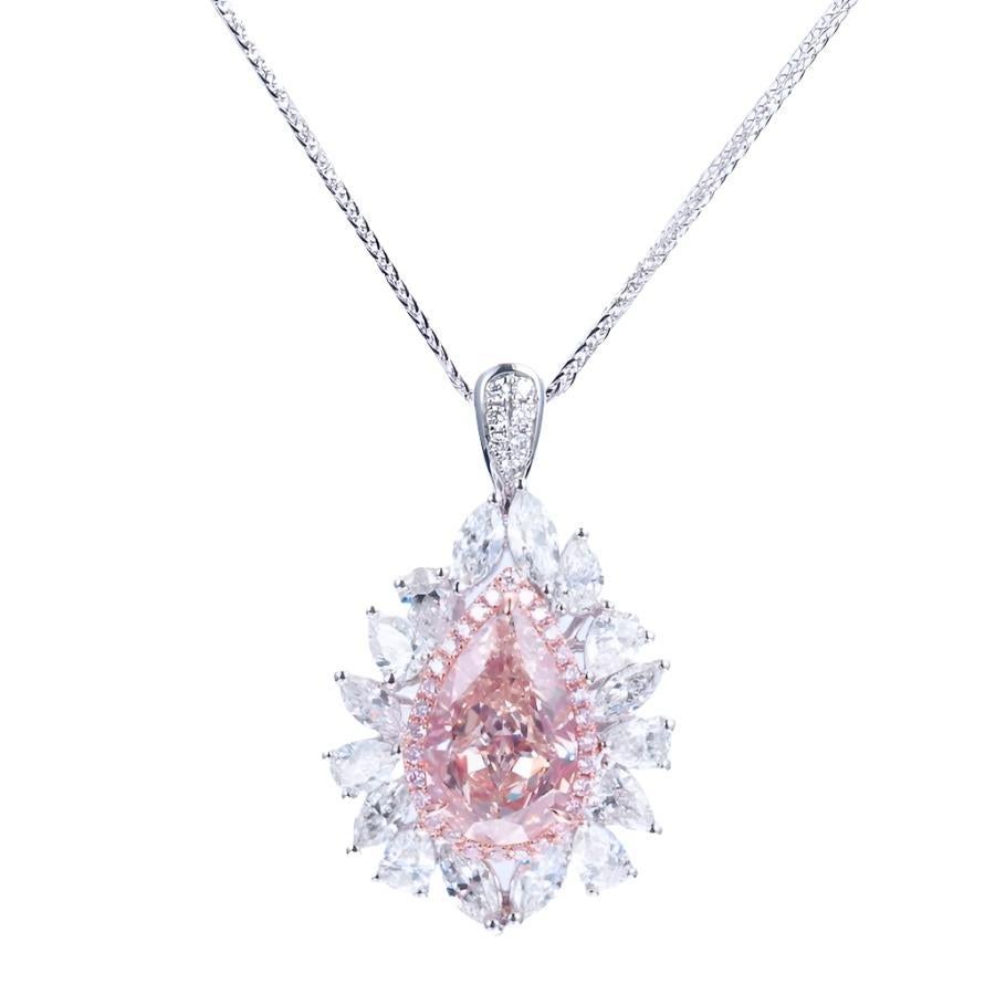 2.53 Carat Pear Shape Center
'Very Light Brown' Center Diamond with sweet pink hue
1.70 Carats of Surrounding White Marquise Cut and Pear Shape Diamonds
VS1 Clarity
Very Good and Very Good Cutting
No Fluorescence
Crafted in 18k White Gold and