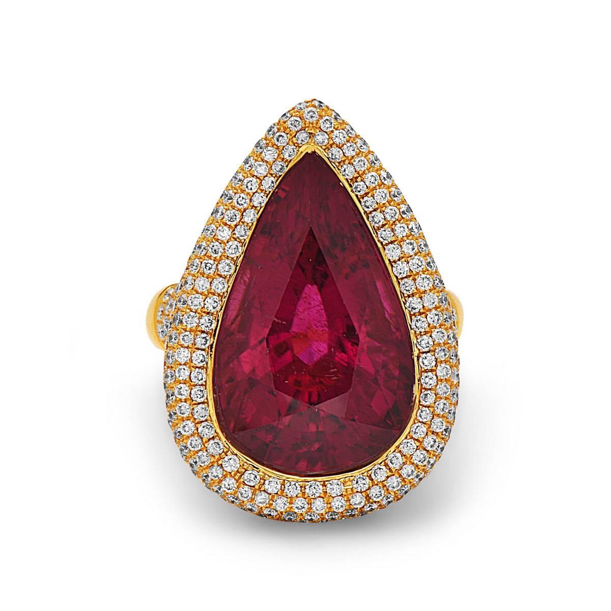 Majestic Pear shape Top Gem Quality Rubelite bezel set Cocktail Ring with pave diamonds around and on shank set in 18K yellow gold.
Ring Size: 6 (can be sized)

 
18kt:10.2g
Diamond:2.5ct
Rubilite:15ct