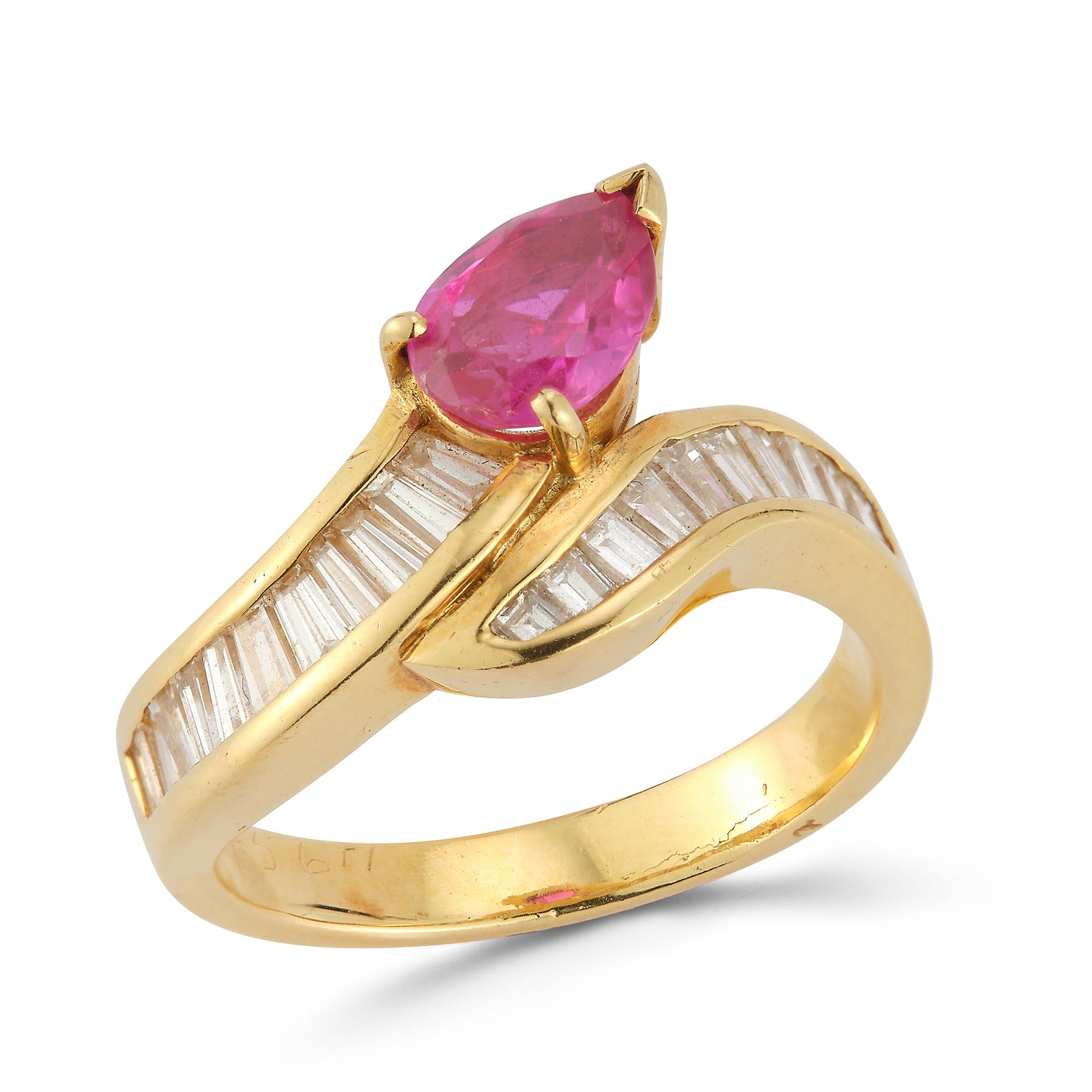 Pear Shape Ruby & Diamond Cocktail Ring 

 1 pear shape ruby approximately .85 cts & baguette cut diamonds approximately 1.12 cts set in 18k yellow gold 

Ring Size: 7 

Resizable free of charge 

