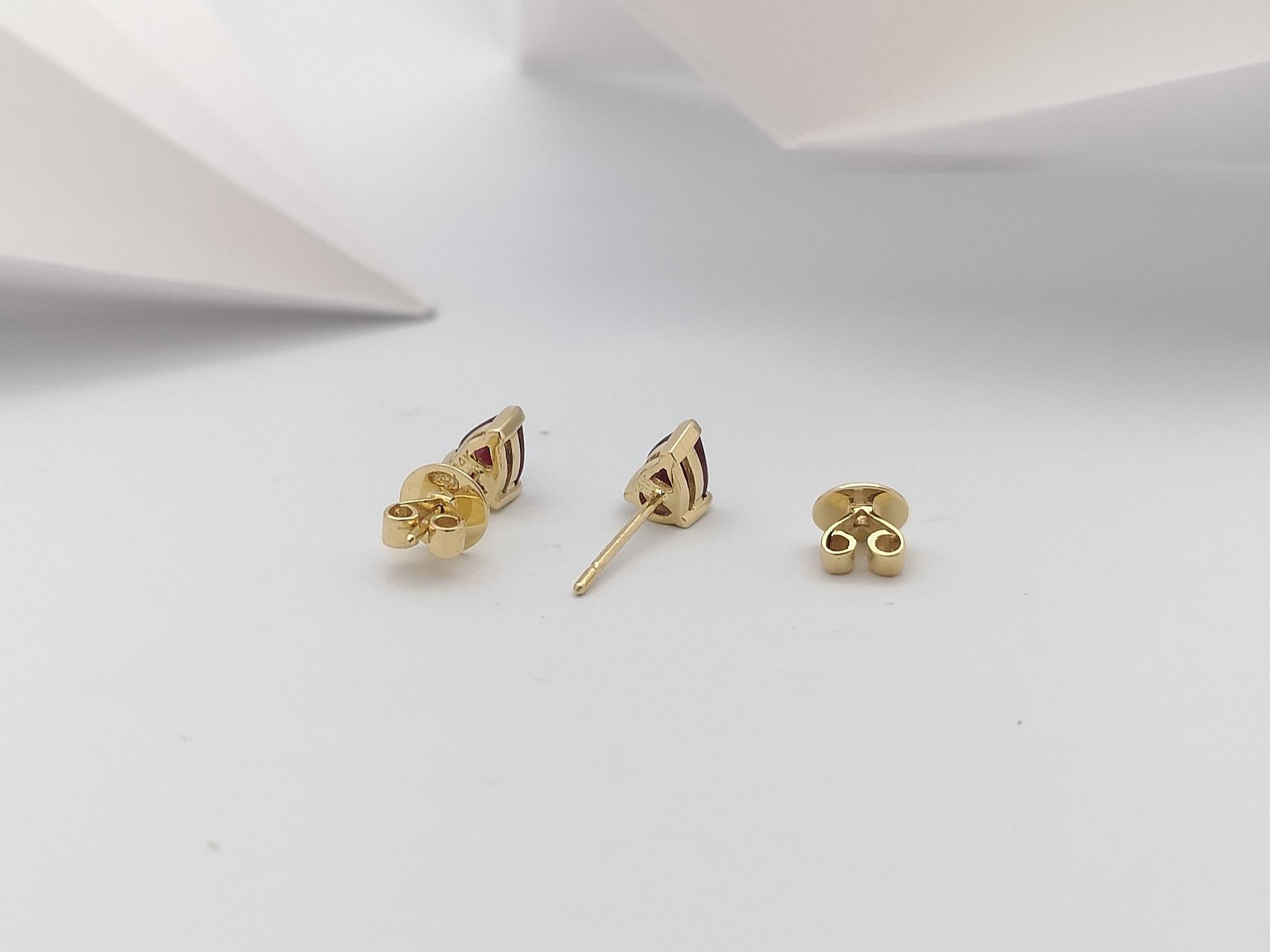 Pear Shape Ruby Stud Earrings Set in 14 Karat Gold Settings For Sale 4