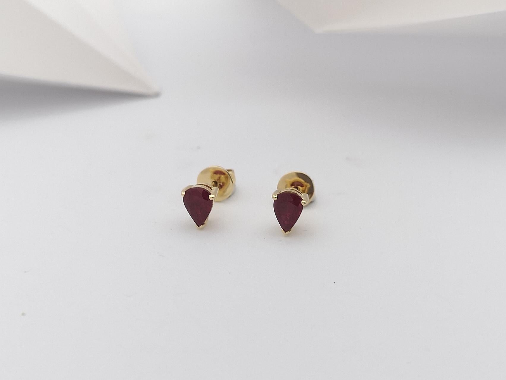 Pear Shape Ruby Stud Earrings Set in 14 Karat Gold Settings For Sale 5