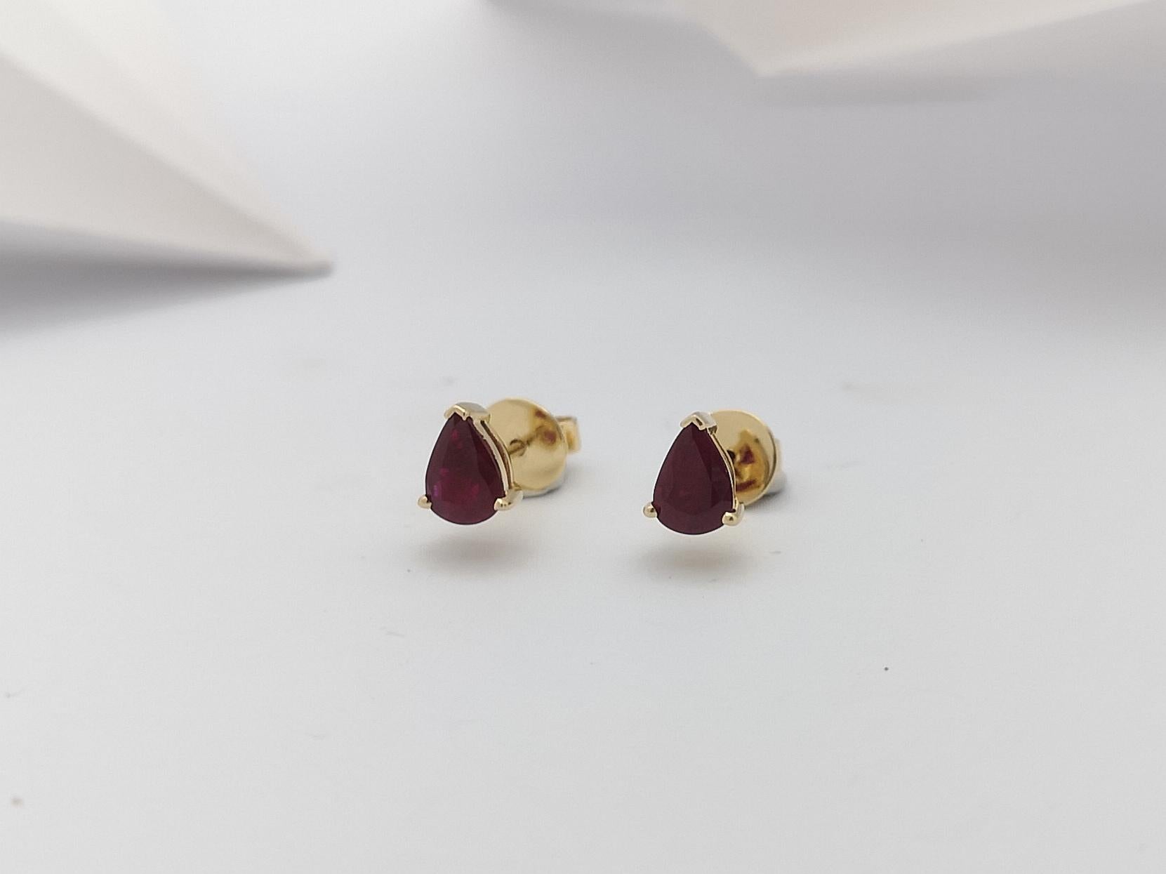 Pear Shape Ruby Stud Earrings Set in 14 Karat Gold Settings For Sale 6