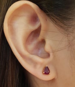 Pear Shape Ruby Stud Earrings Set in 14 Karat Gold Settings