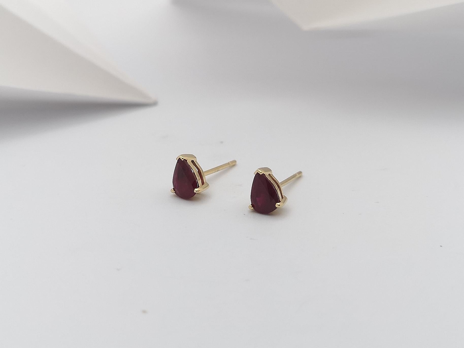 Pear Shape Ruby Stud Earrings Set in 14 Karat Gold Settings For Sale 1