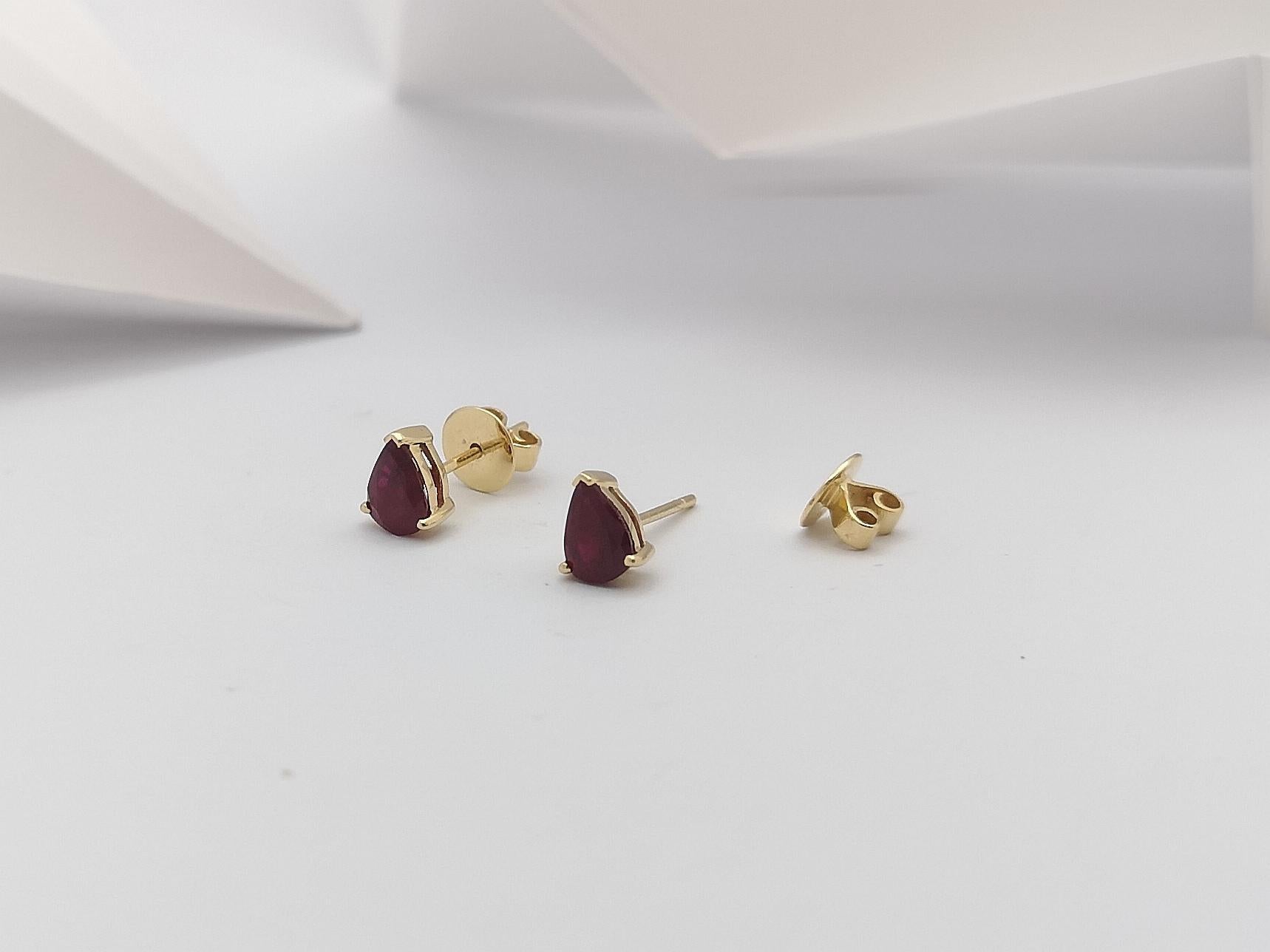 Pear Shape Ruby Stud Earrings Set in 14 Karat Gold Settings For Sale 2