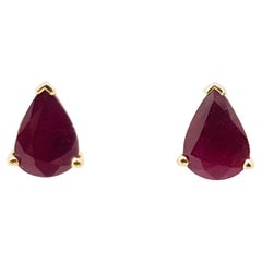 Pear Shape Ruby Stud Earrings Set in 14 Karat Gold Settings