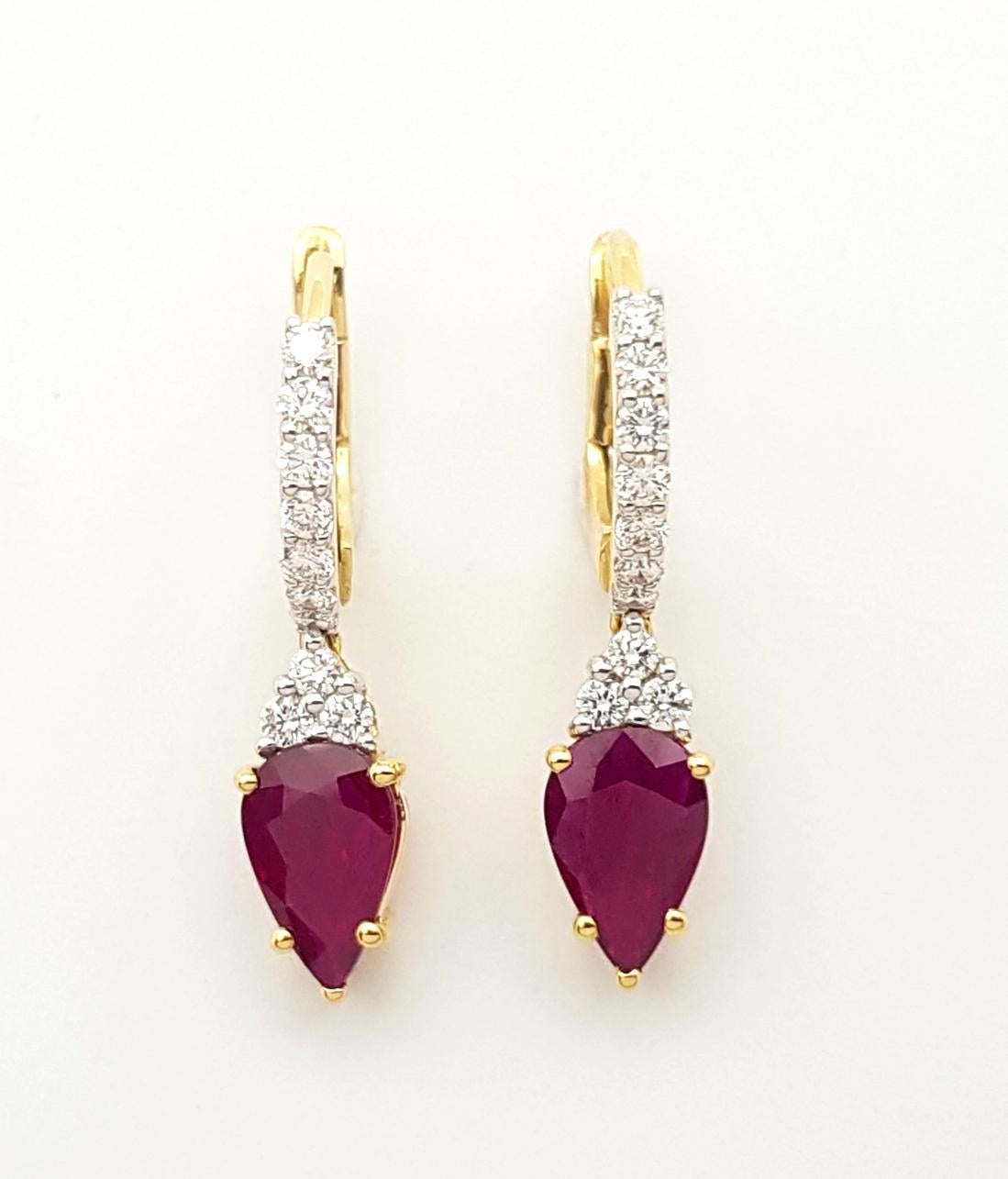 Contemporary Pear Shape Ruby with Diamond Earrings Set in 18k Gold Settings For Sale