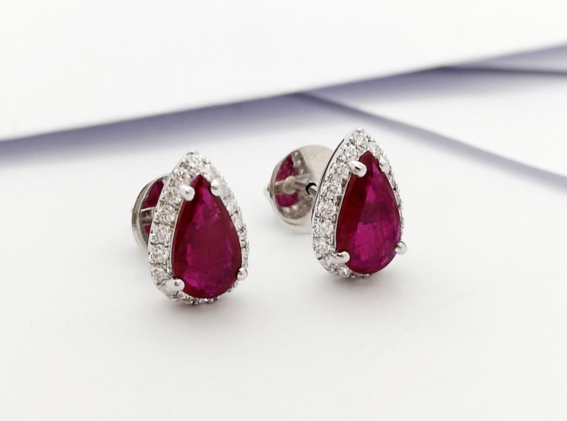 Ruby 2.17 carats with Diamond 0.44 carat Earrings set in 18K White Gold Settings

Width: 0.4 cm 
Length: 1.2 cm
Total Weight: 3.74 grams

