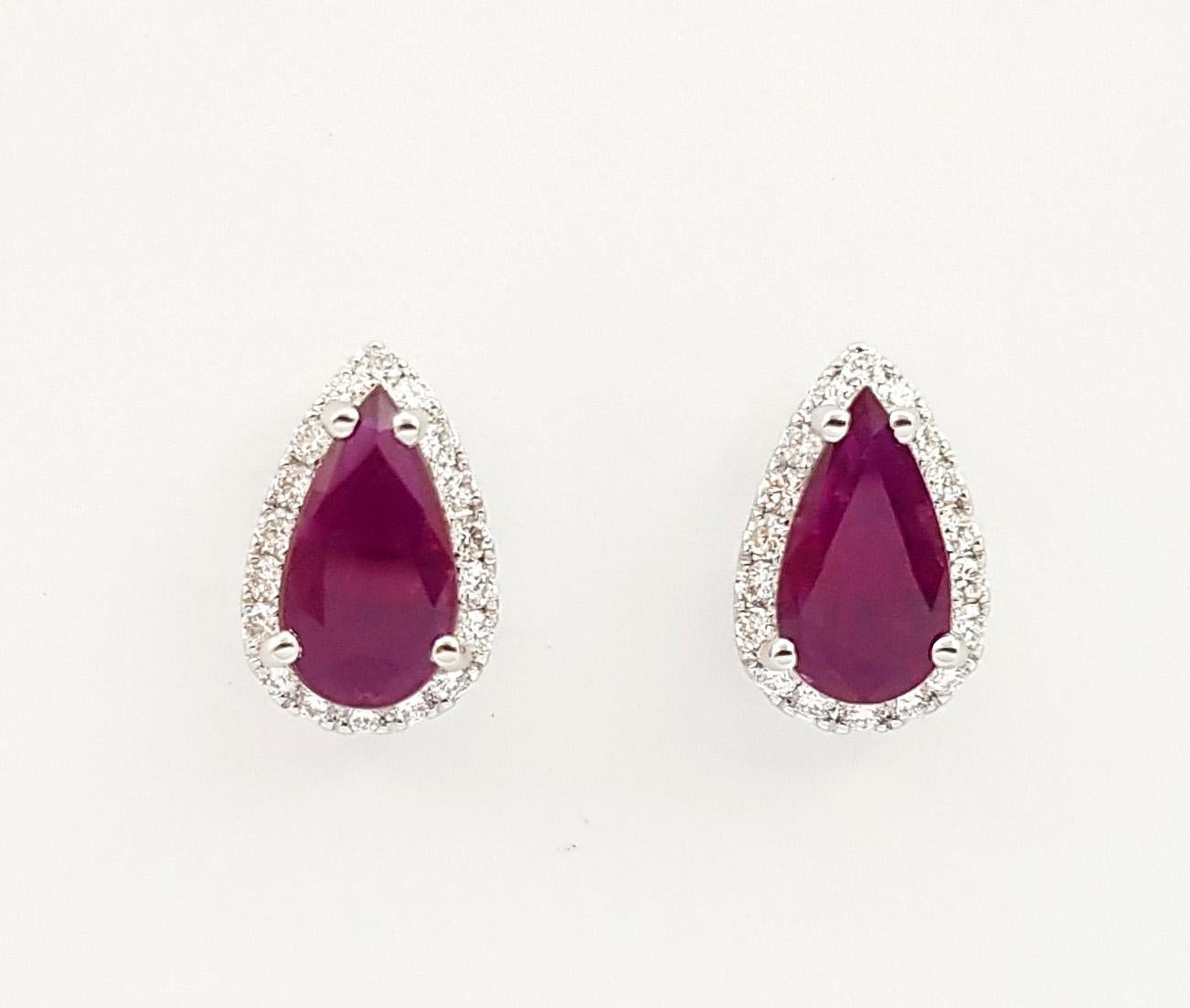 Contemporary Pear Shape Ruby with Diamond Earrings set in 18K White Gold Settings For Sale