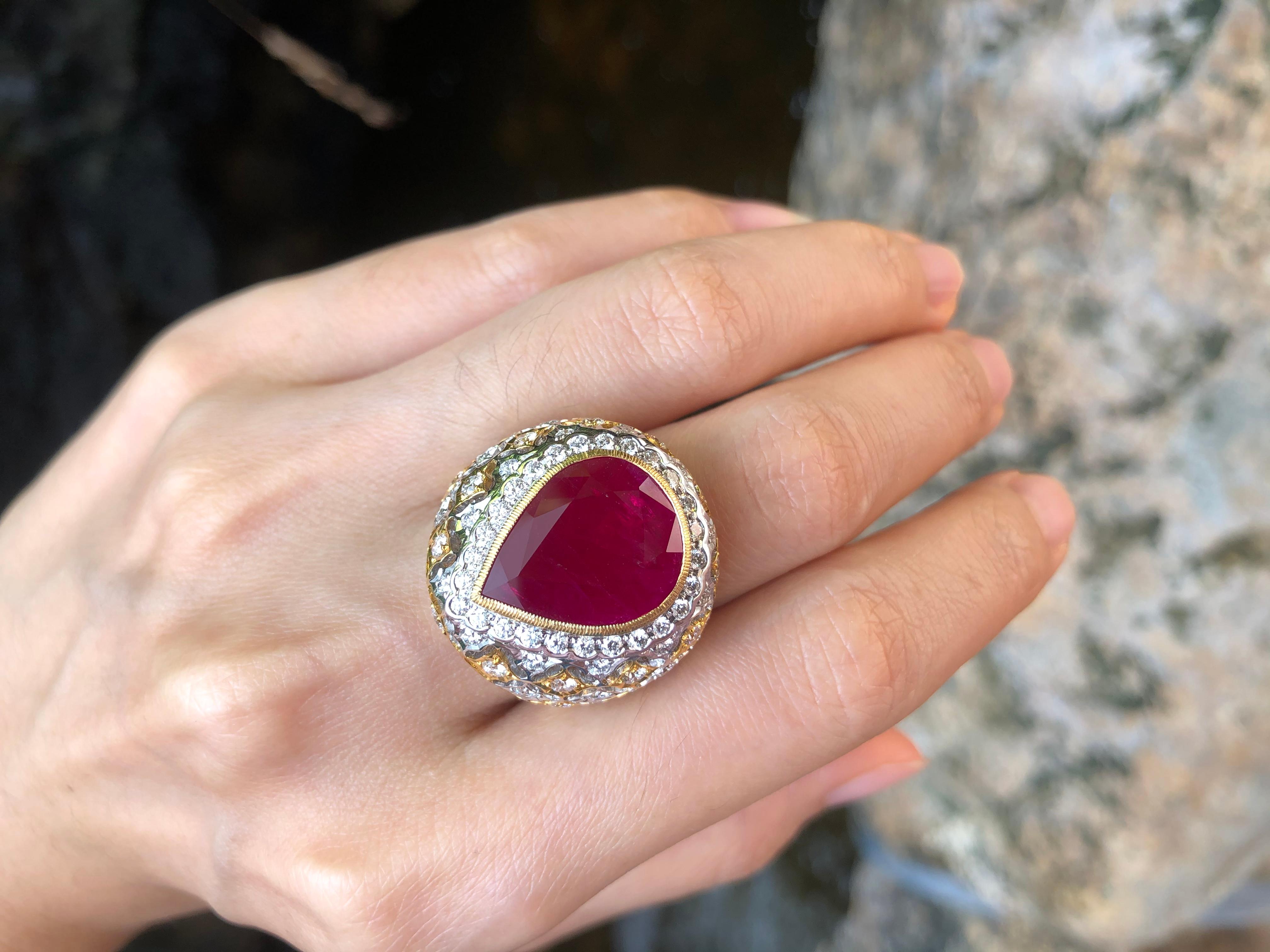 Ruby 8.34 carats with Diamond 1.96 carats Ring set in 18 Karat Gold Settings

Width:  1.4 cm 
Length: 1.8 cm
Ring Size: 57
Total Weight: 20.78 grams

