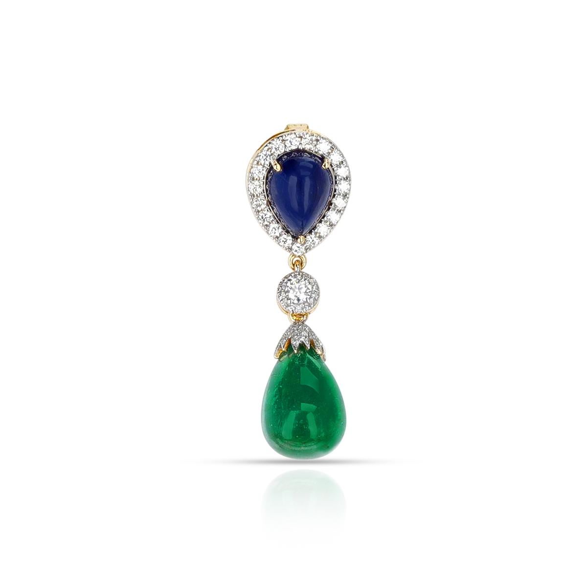 A Pear Shape Sapphire and Emerald Drop Pendant with Diamonds made in 18 Karat Yellow Gold. The emerald weighs appx. 9 carats and the sapphire weights appx. 4 carats. The diamonds weigh 0.57 carats. The length of the pendant is 1.50 inches. The total