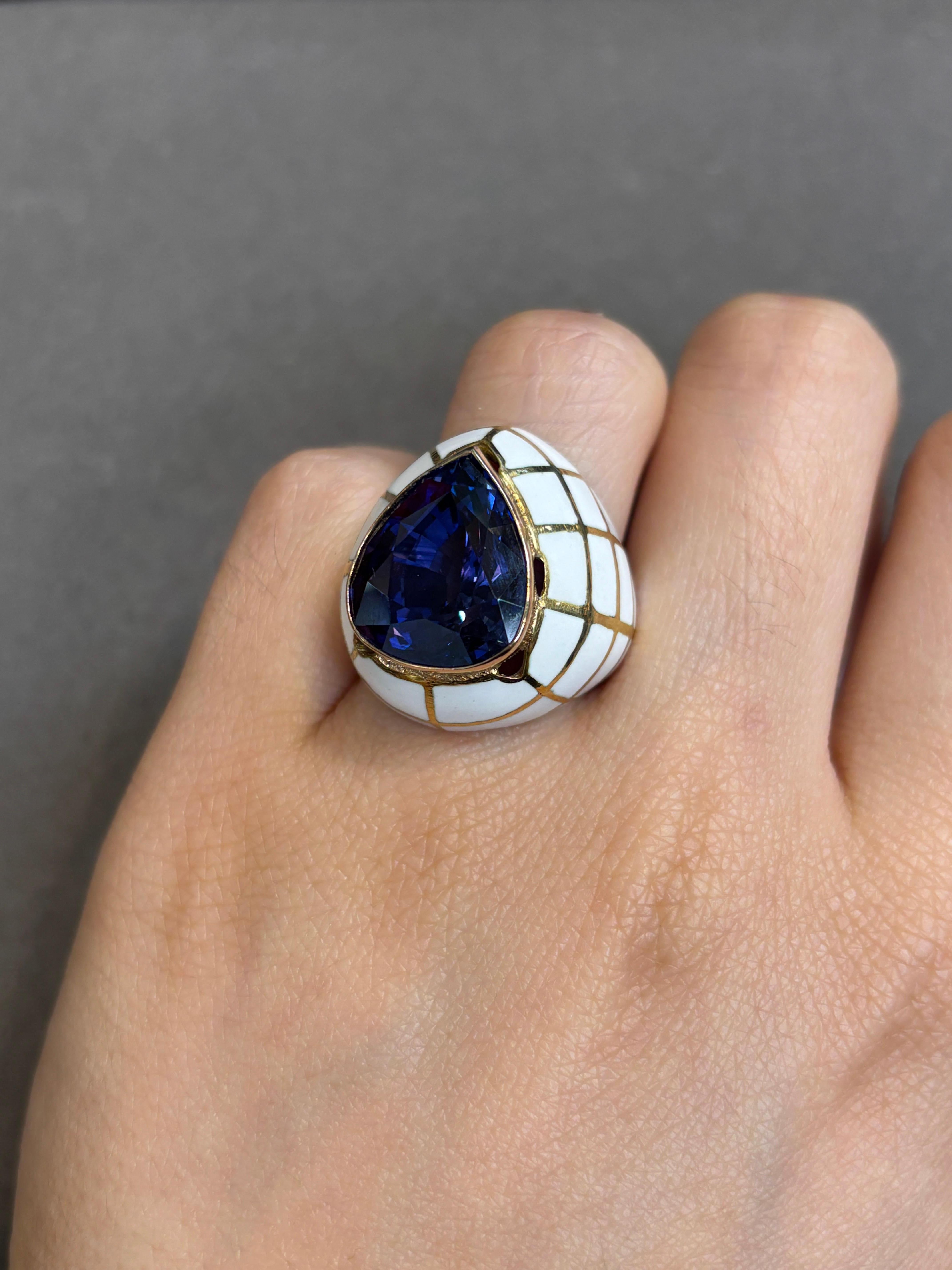 Pear Shape Sapphire and Enamel Ring

A domed yellow gold ring with white enamel set with a pear shaped sapphire 

Approximate Sapphire Weight: 17.84 carat 
Ring Size: 6
Complimentary resizing 
Metal Type: 14 karat gold