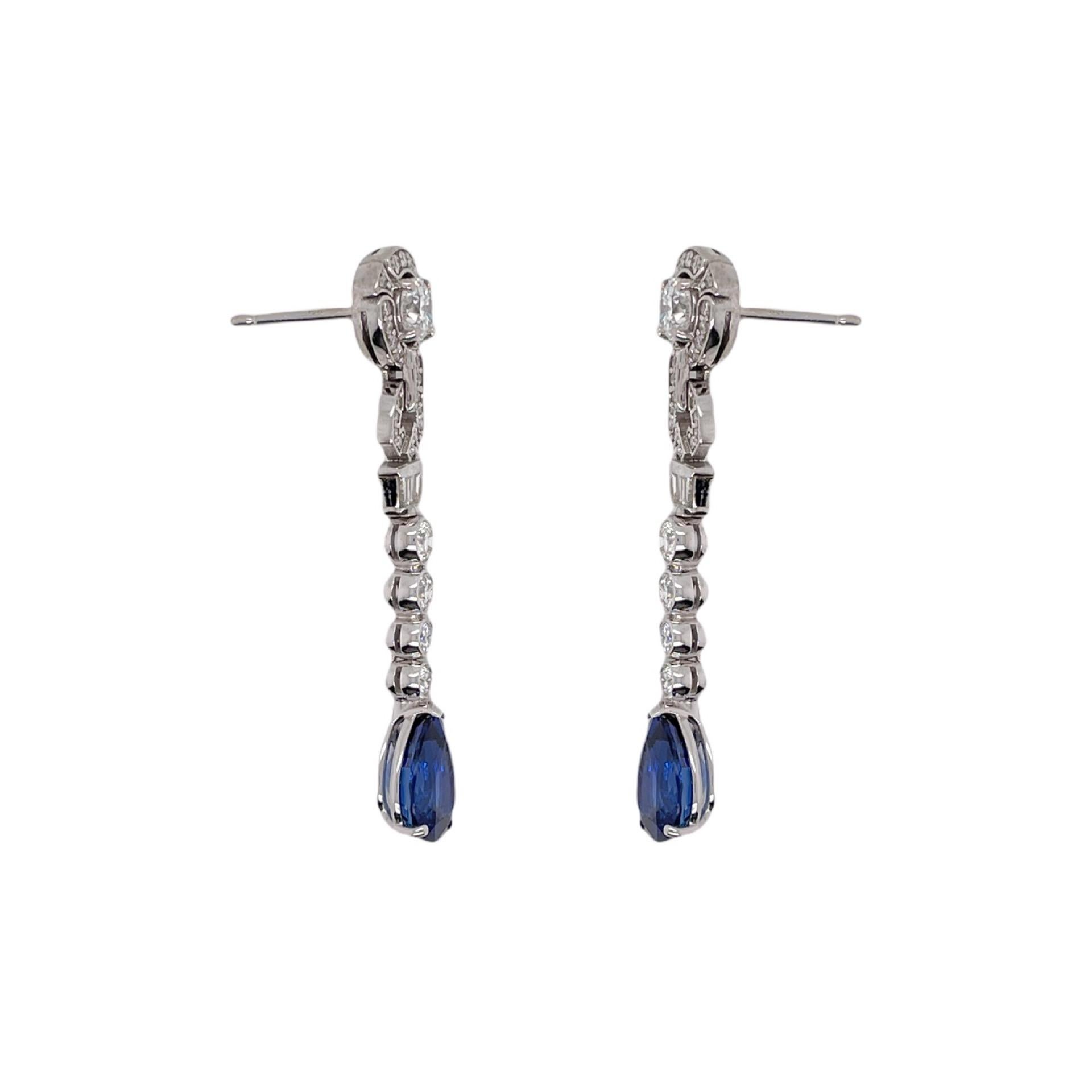 Earrings contain 2 fine pear shape sapphires 4.90tcw, 2 round brilliant diamonds on the top 0.82tcw and round brilliant & baguette diamonds within entire earring, 1.10tcw. Sapphires are GIA certified and originate from Madagascar. Diamonds are