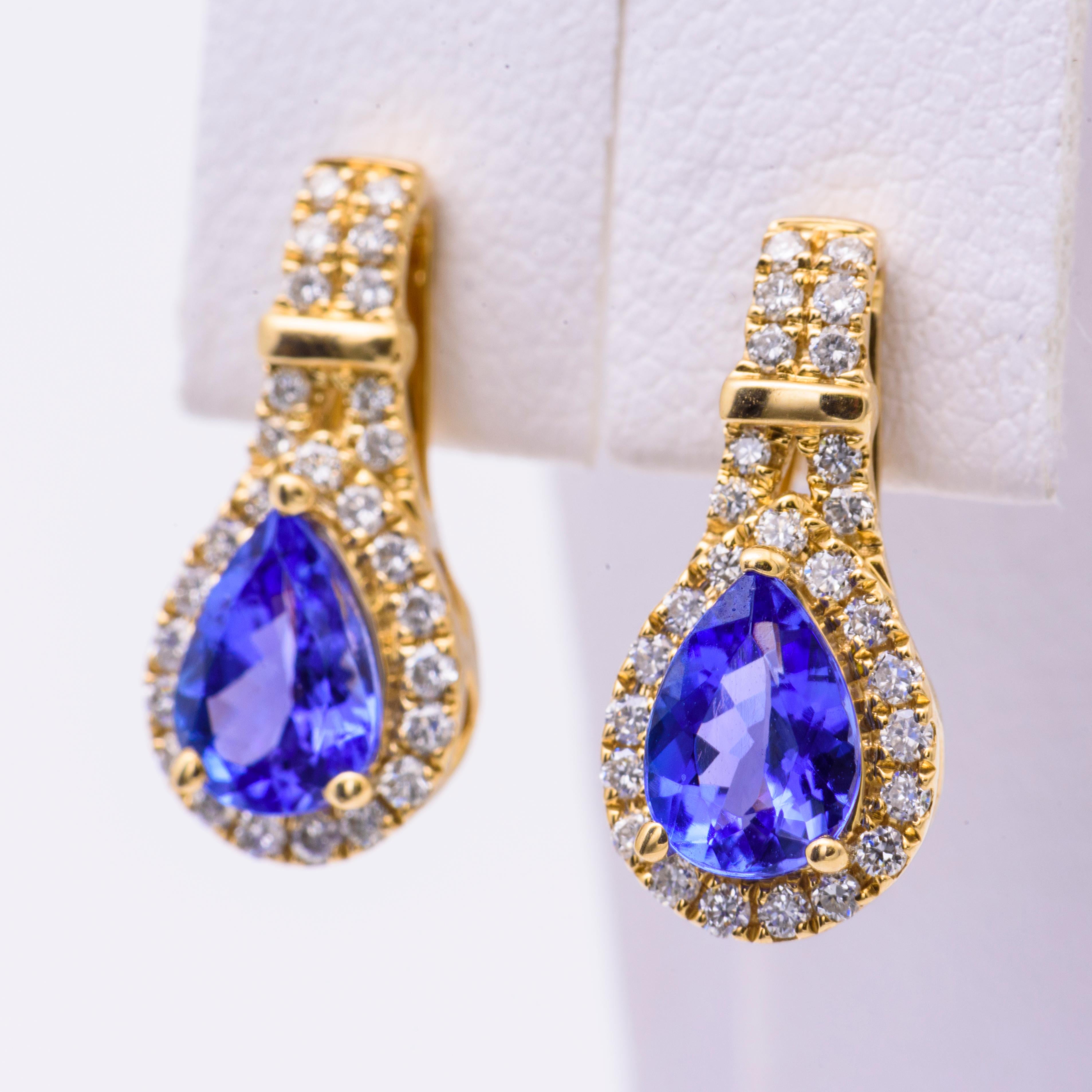 The pear shape sapphire in these earrings have a total carat weight of 1.72 carats. 
The diamonds have a total carat weight of 0.37 carats.
The earrings measures 16 mm long, they are available in white and yellow gold.
All our gemstones are genuine