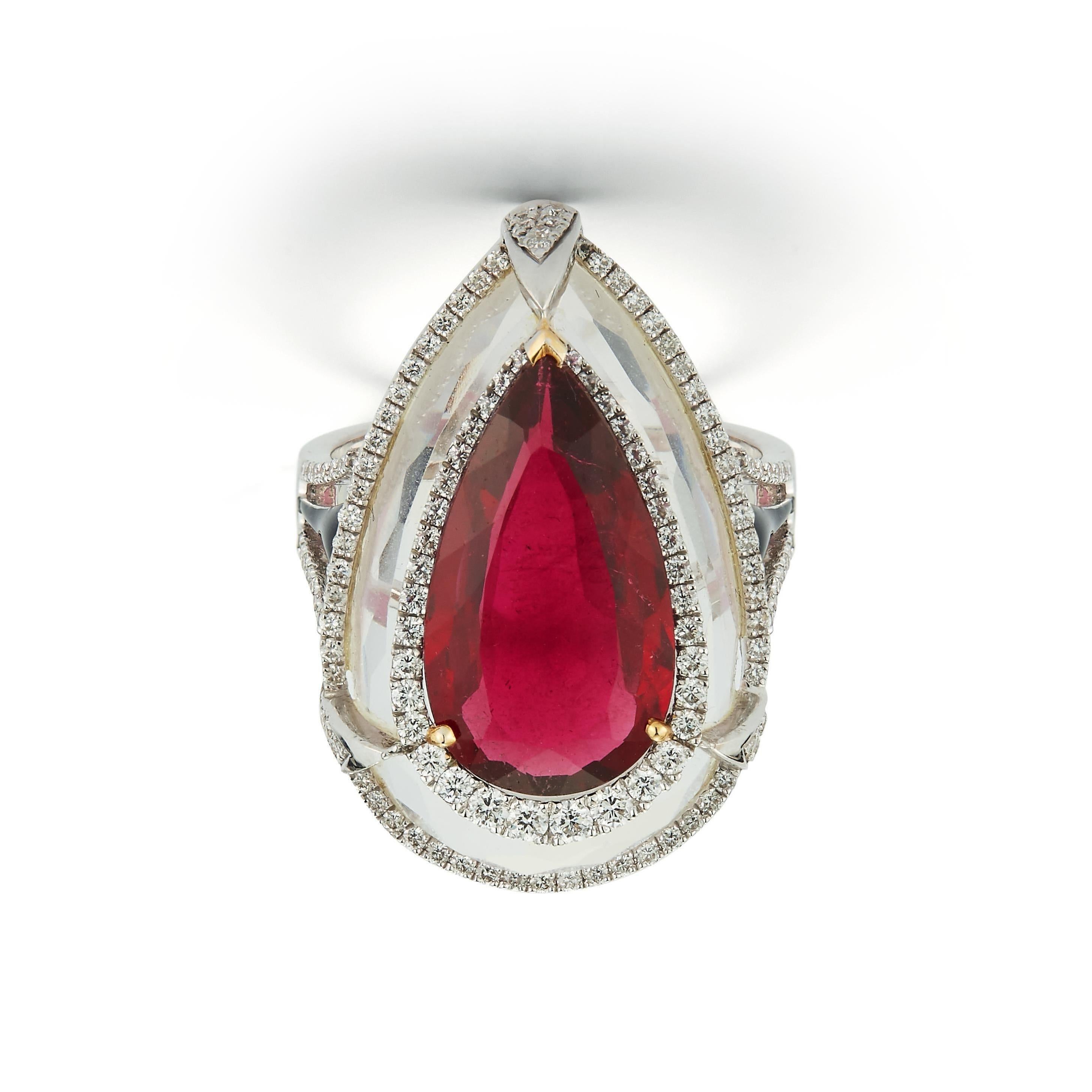 Pear Shape Tourmaline Set in Rock Crystal Ring  
Tourmaline Weight: Approximately 7.08 cts 
Diamond Weight:  Approximately .83 Cts 
Ring Size: 6.5
Resizable free of charge 
18K White Gold 
