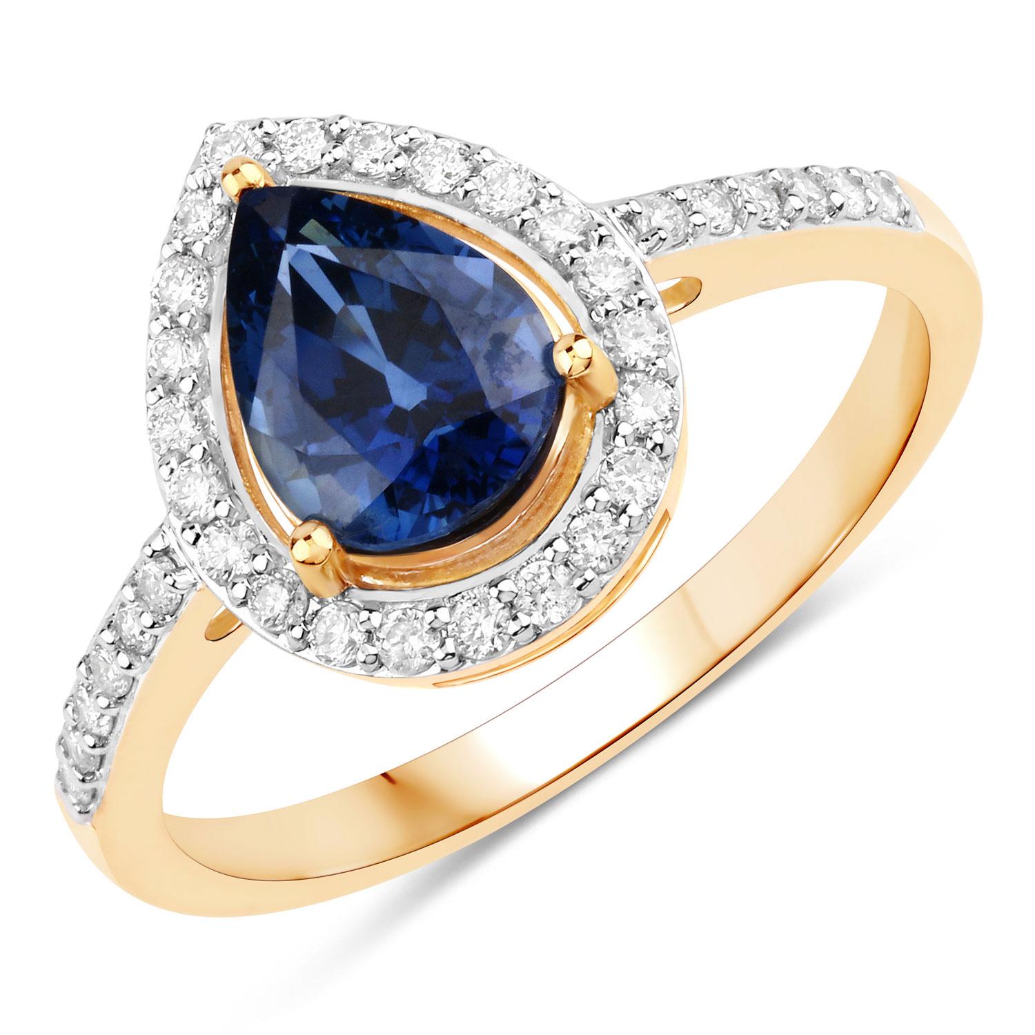 Bague en or jaune 14 carats avec saphir bleu vif en forme de poire et diamants en vente 1